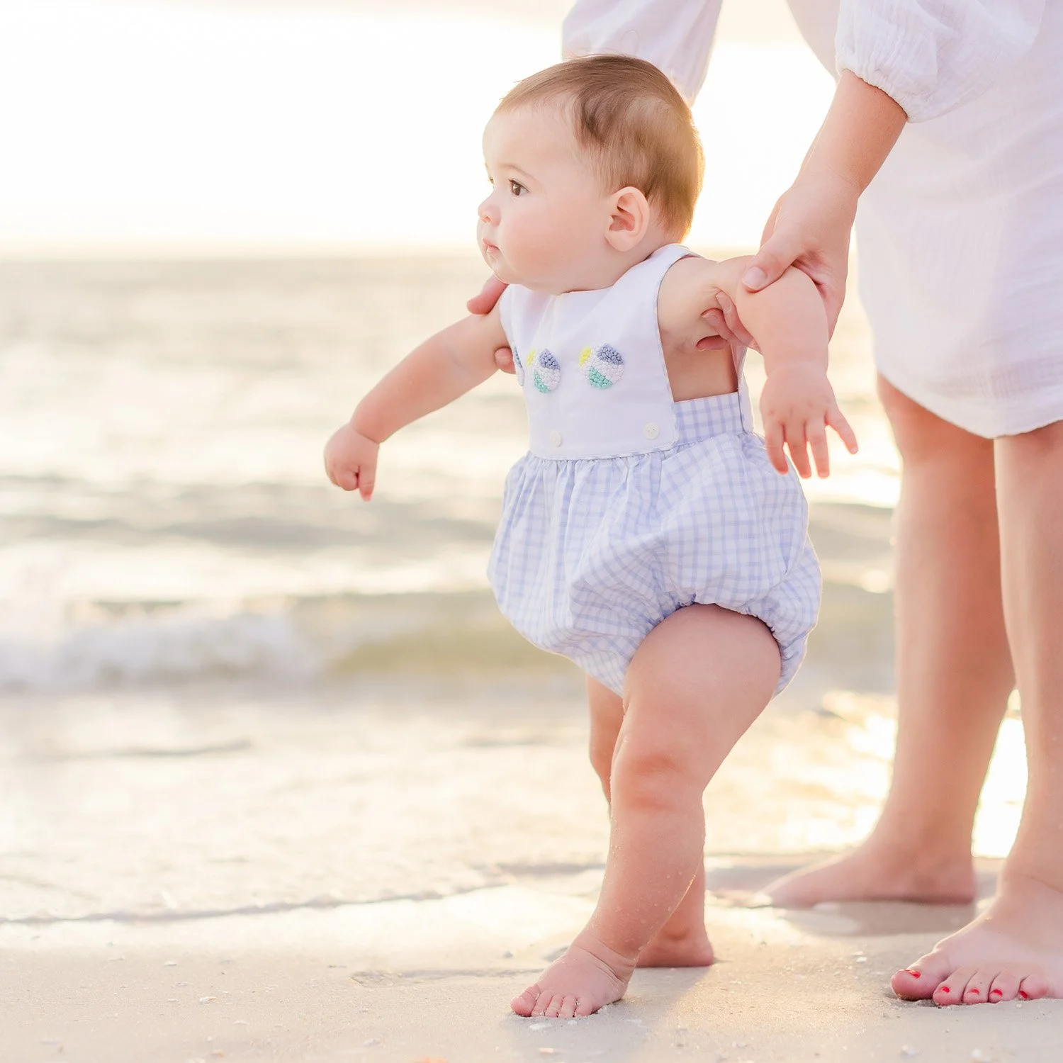 savor-naples-baby-first-steps-beach-sunset.jpg