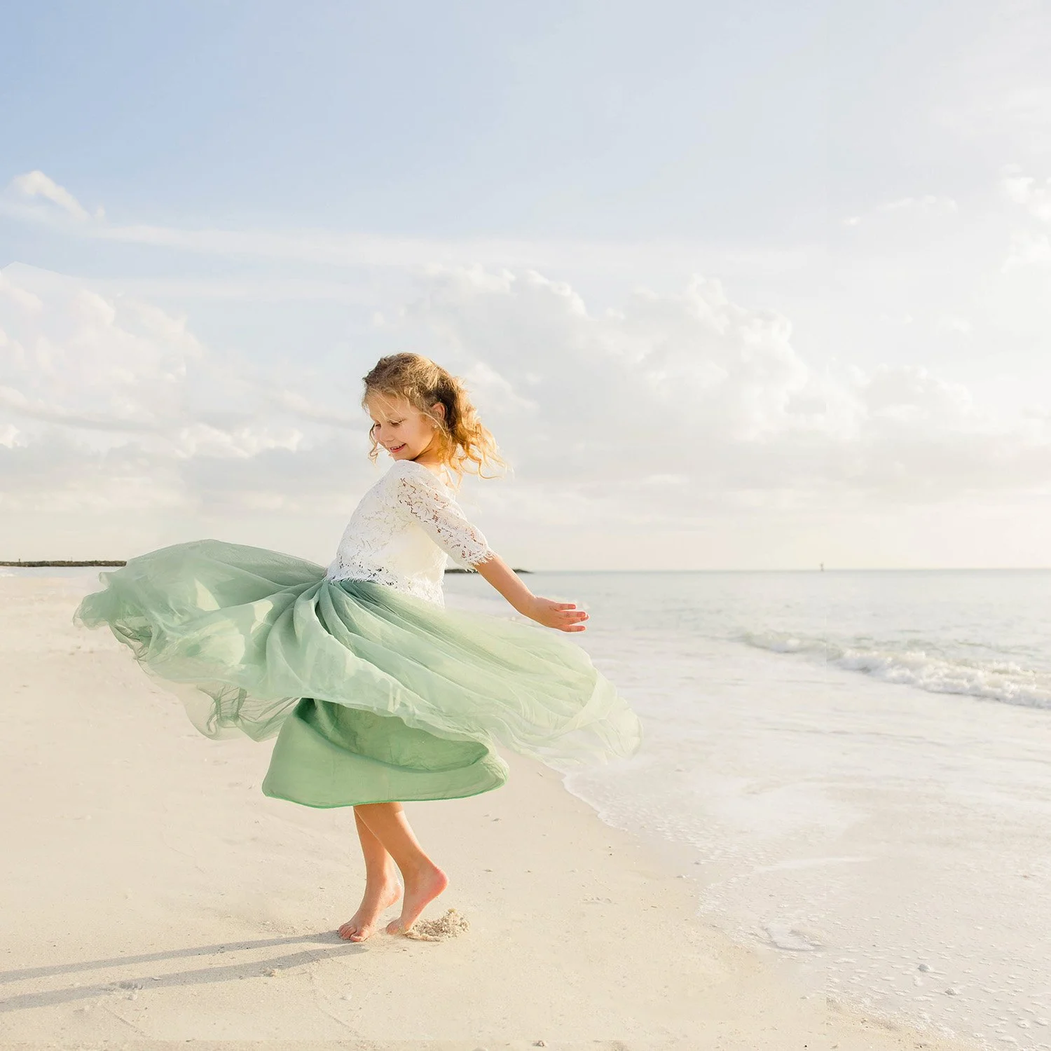 savor-naples-child-portrait-coastal-twirl.jpg