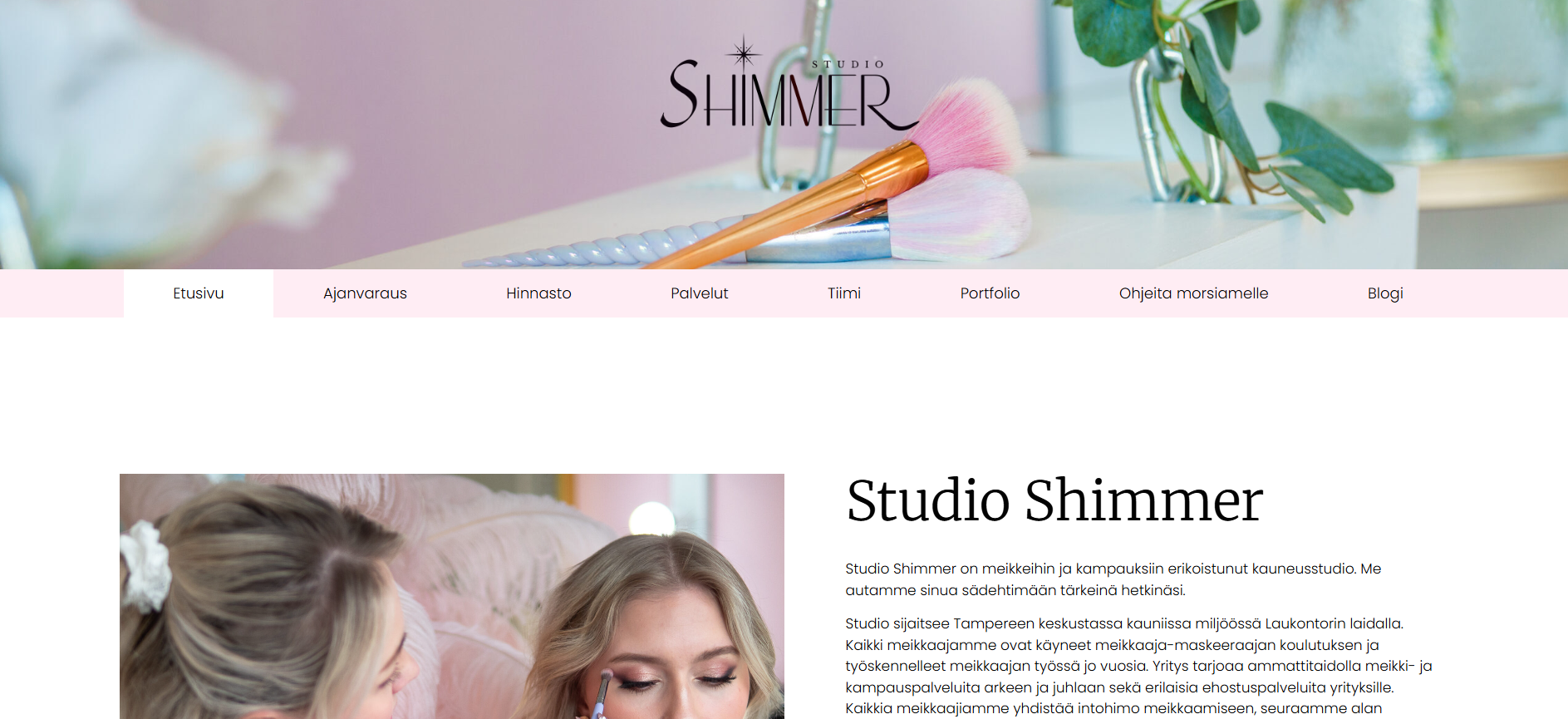 Website homepage for Studio Shimmer, a beauty studio in Tampere, Finland. The header features makeup brushes on a table with green plants in the background. The navigation menu includes options such as Home, Booking, Prices, Services, Team, Portfolio, Instructions for Lash Extensions, and Blog. The main section shows a woman getting makeup applied by a makeup artist, with descriptive text about the studio.
