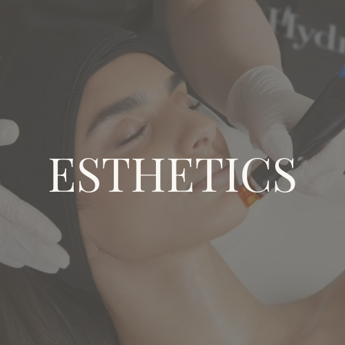 Woman receiving a cosmetic treatment for esthetics, lying with eyes closed, in a clinic setting.