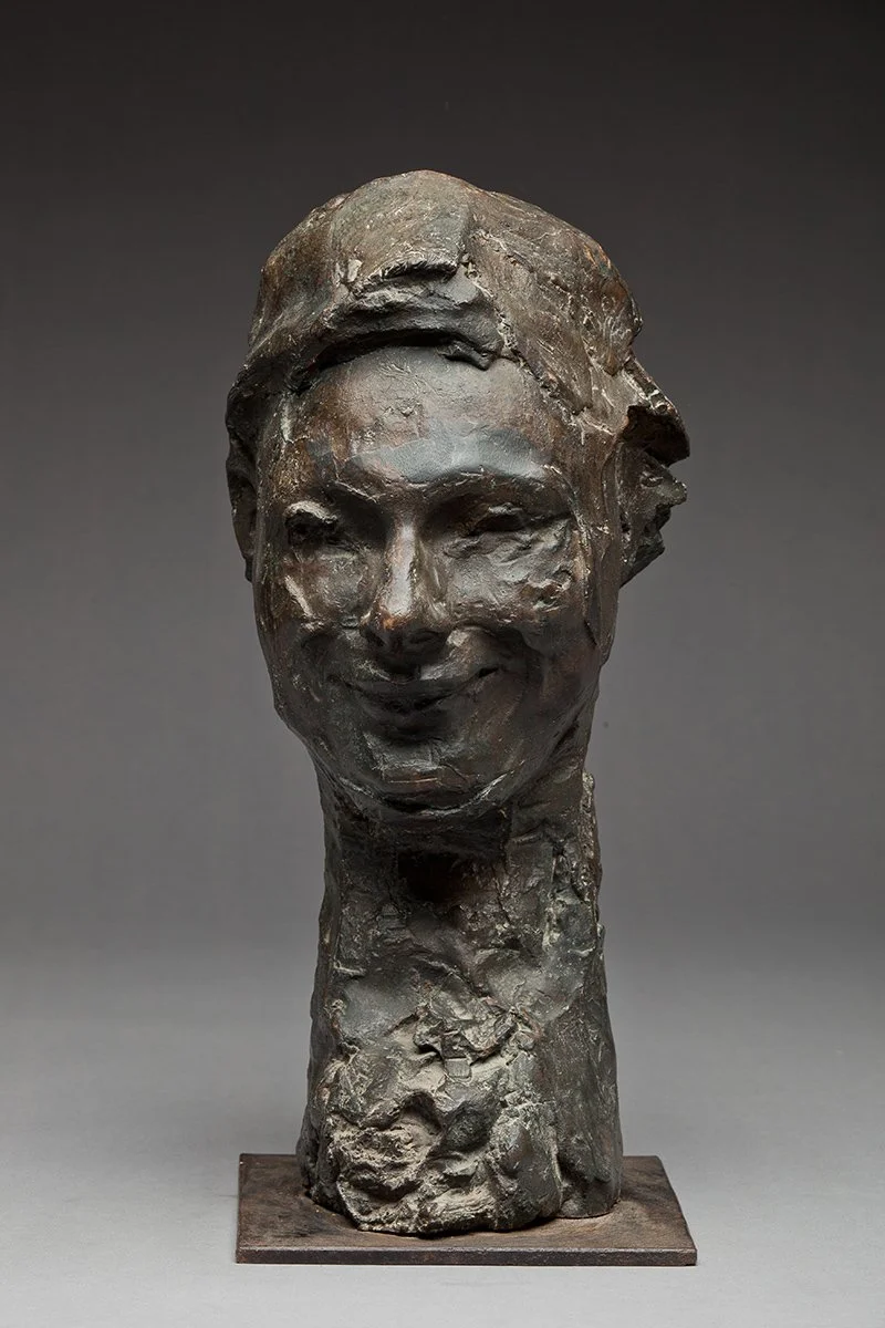 56. Smiling Head, Bronze, 1970, 35 x 22.5 x 18 cm