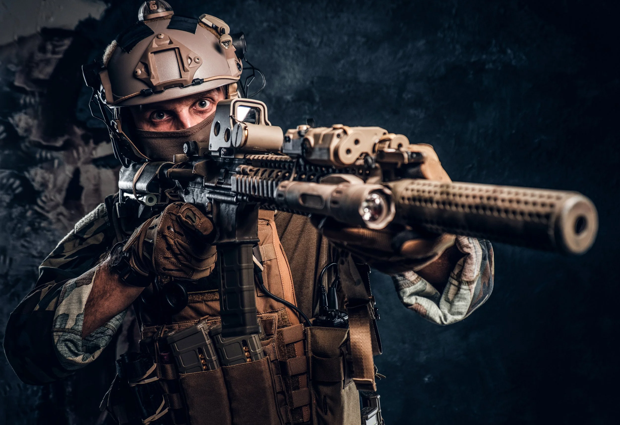close-up-studio-photo-elite-unit-special-forces-soldier-camouflage-uniform-holding-assault-rifle-with-laser-sight-aims-target.jpg
