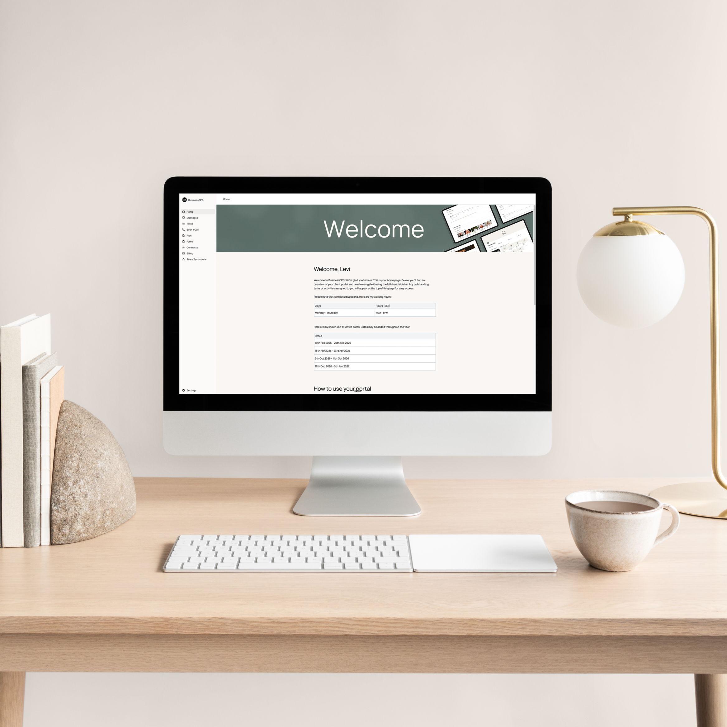 iMac on a minimalist desk displaying a Assembly client portal dashboard for BusinessOPS workspace management.