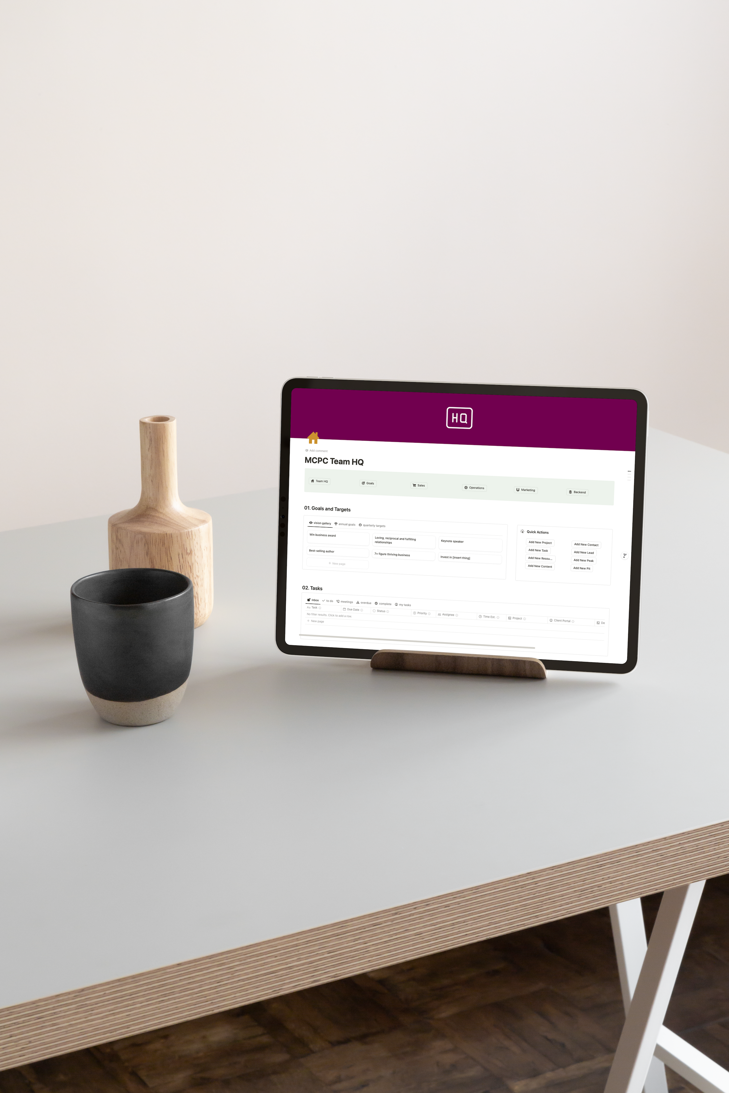 Tablet displaying a Notion team dashboard used to manage goals, tasks and operations inside a company workspace.
