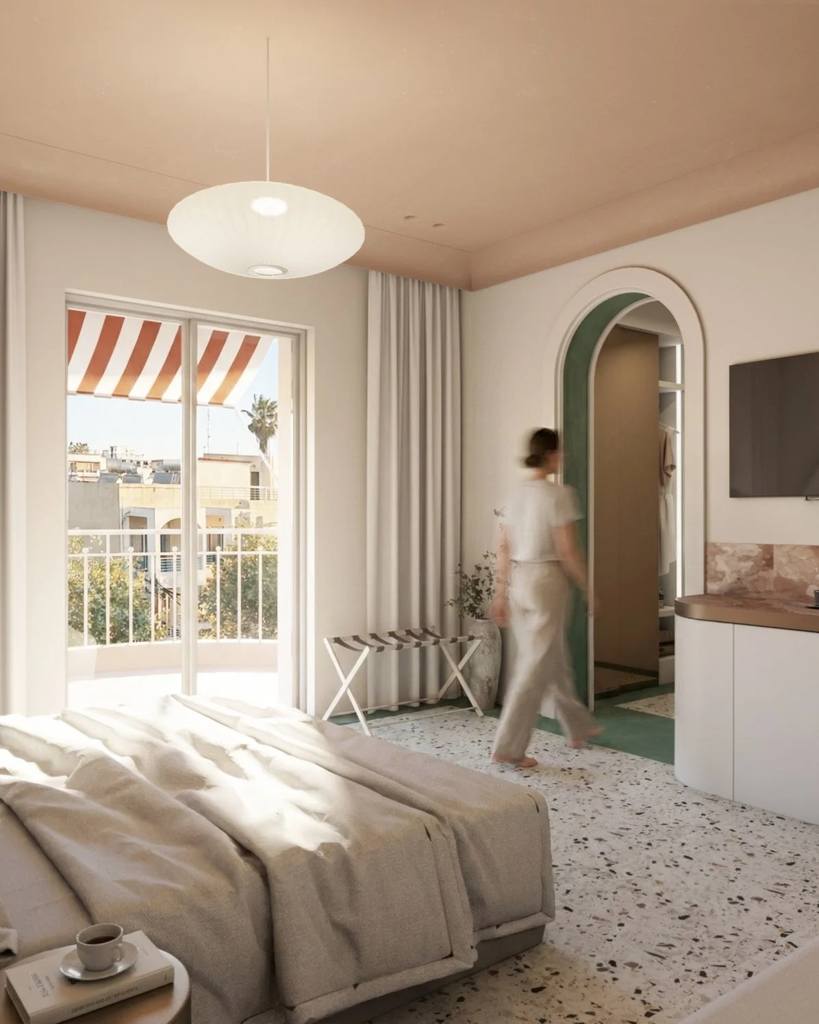 Bright bedroom with a sliding glass door leading to a balcony, a beige bed with a cup and book on a side table, white curtains, a woman walking past an arched doorway, and a flat-screen TV on the wall.