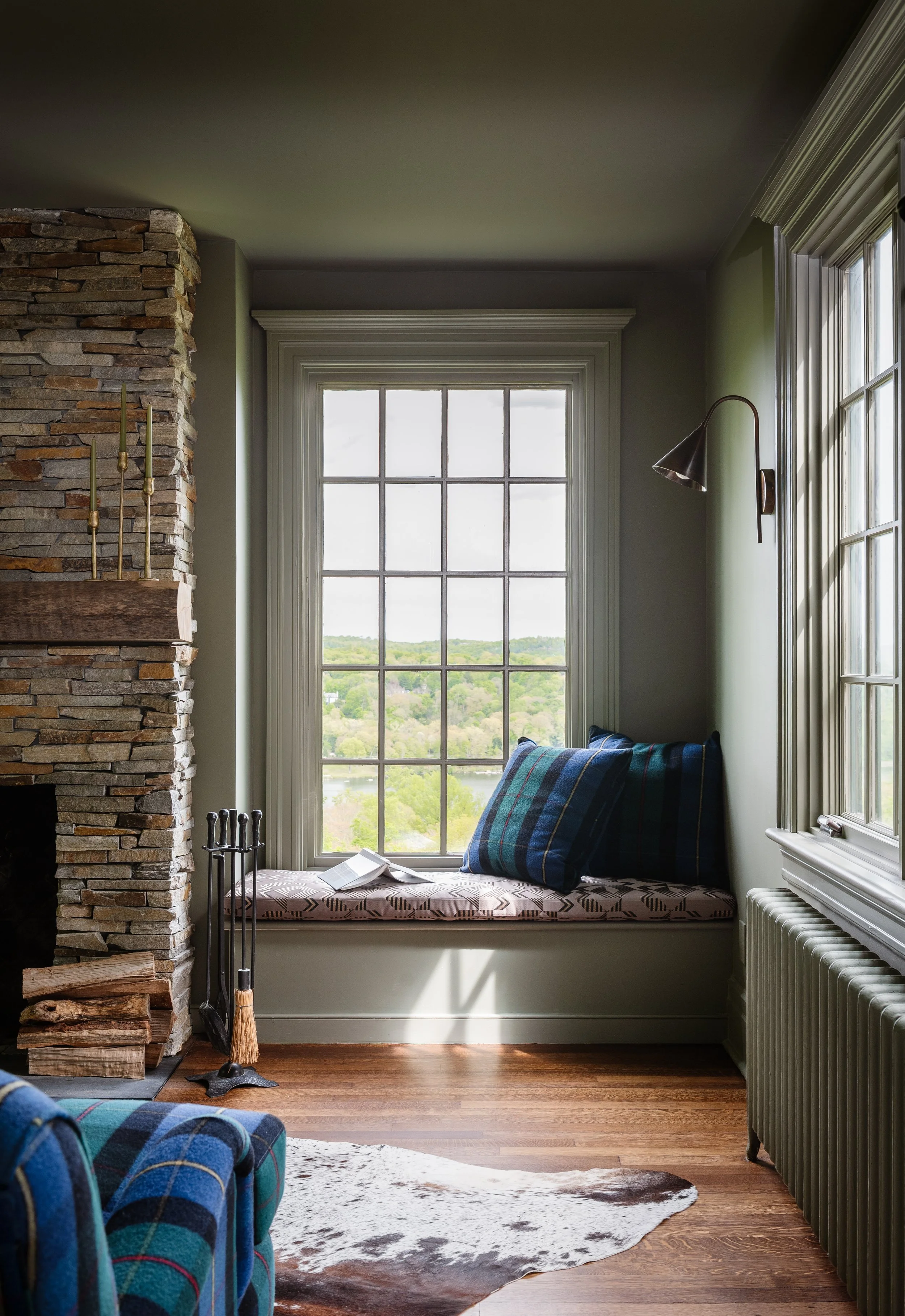 brick fireplace with window bench seat plaid rustic design