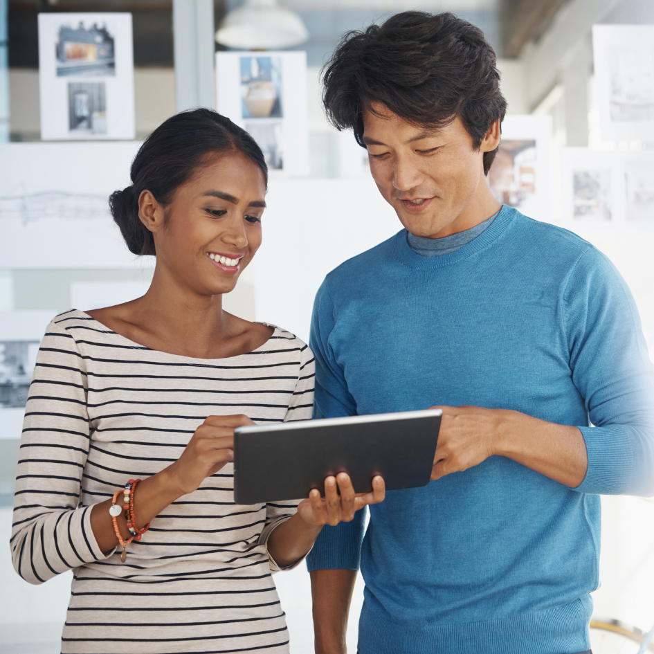 Happy office workers with digital file