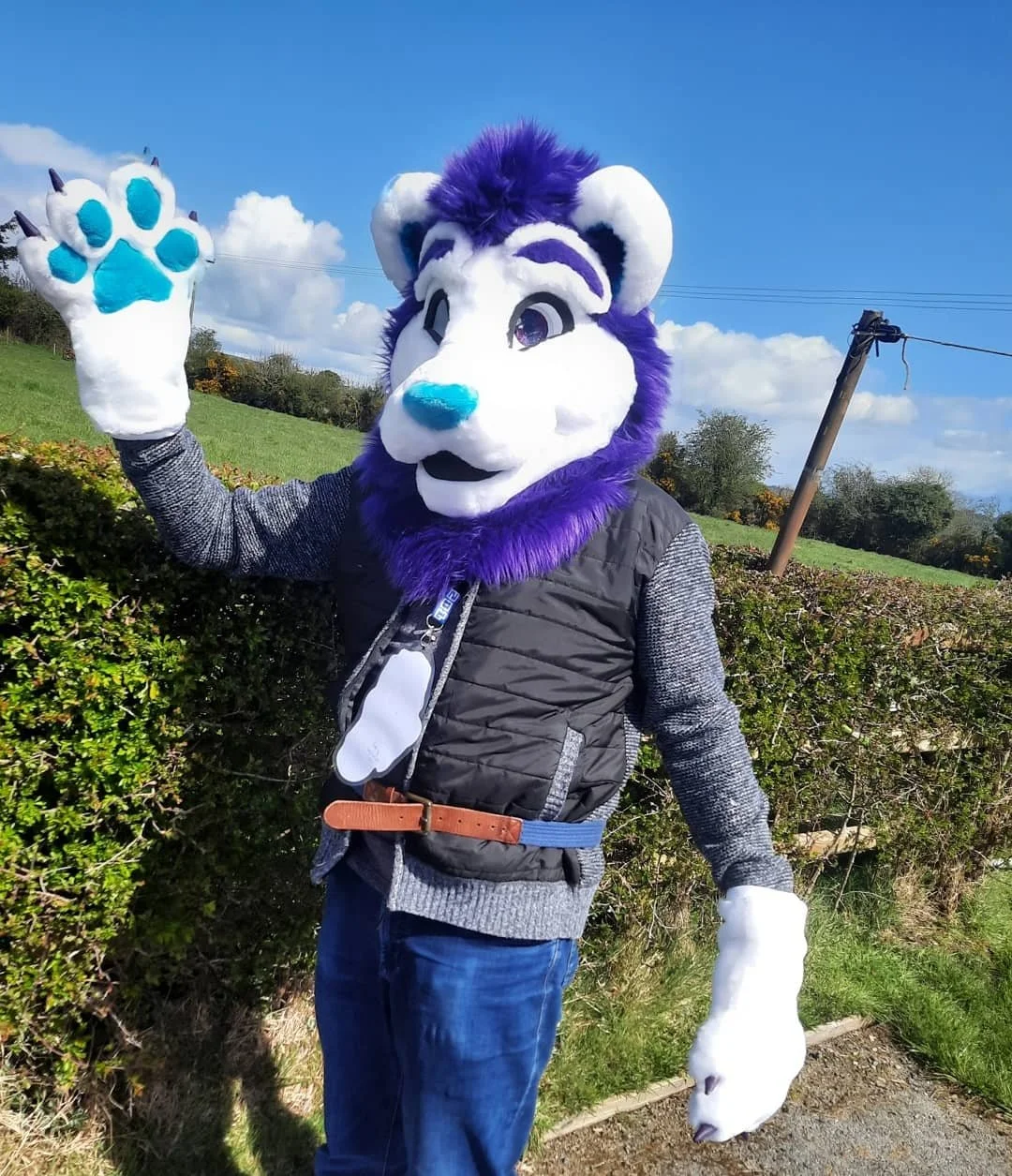 White and purple lion fursuit costume