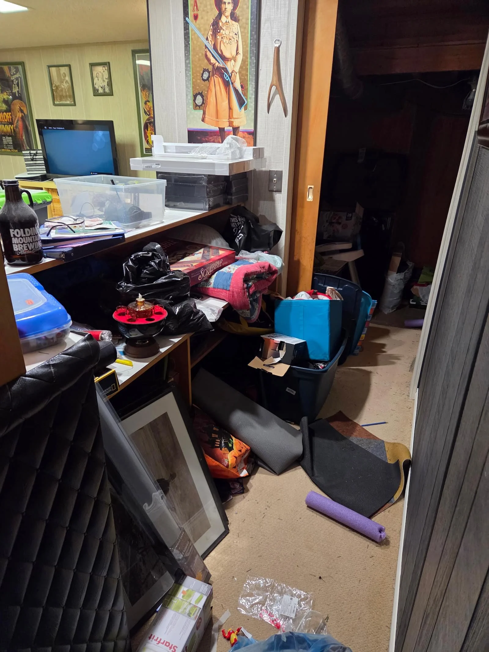 Basement bar area full of clutter, debris, and items which do not belong within the bar space