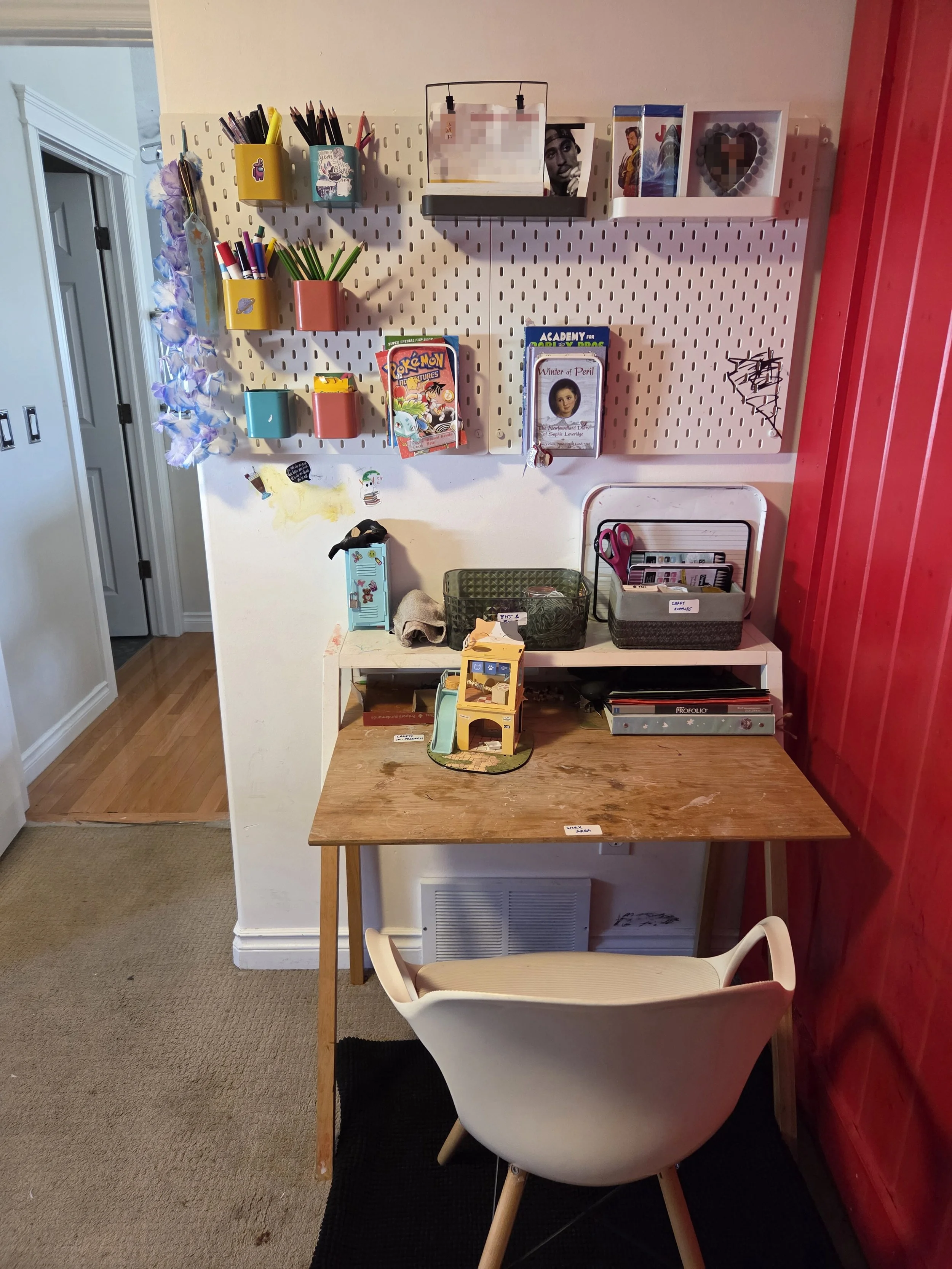 Daughter of client's bedroom, showing a restored craft area following decluttering and system implementation in a session