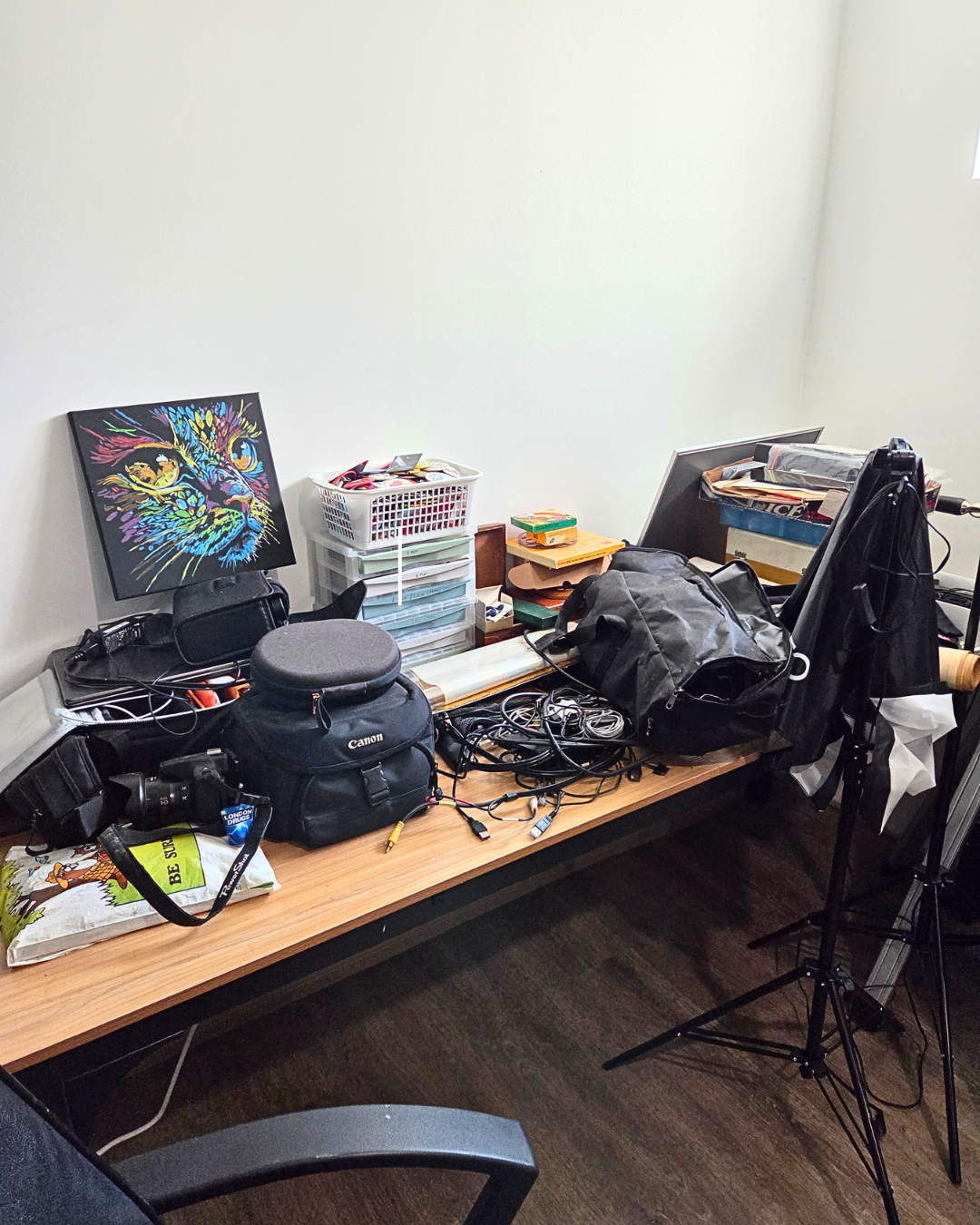 Crowded and cluttered desk in home office space