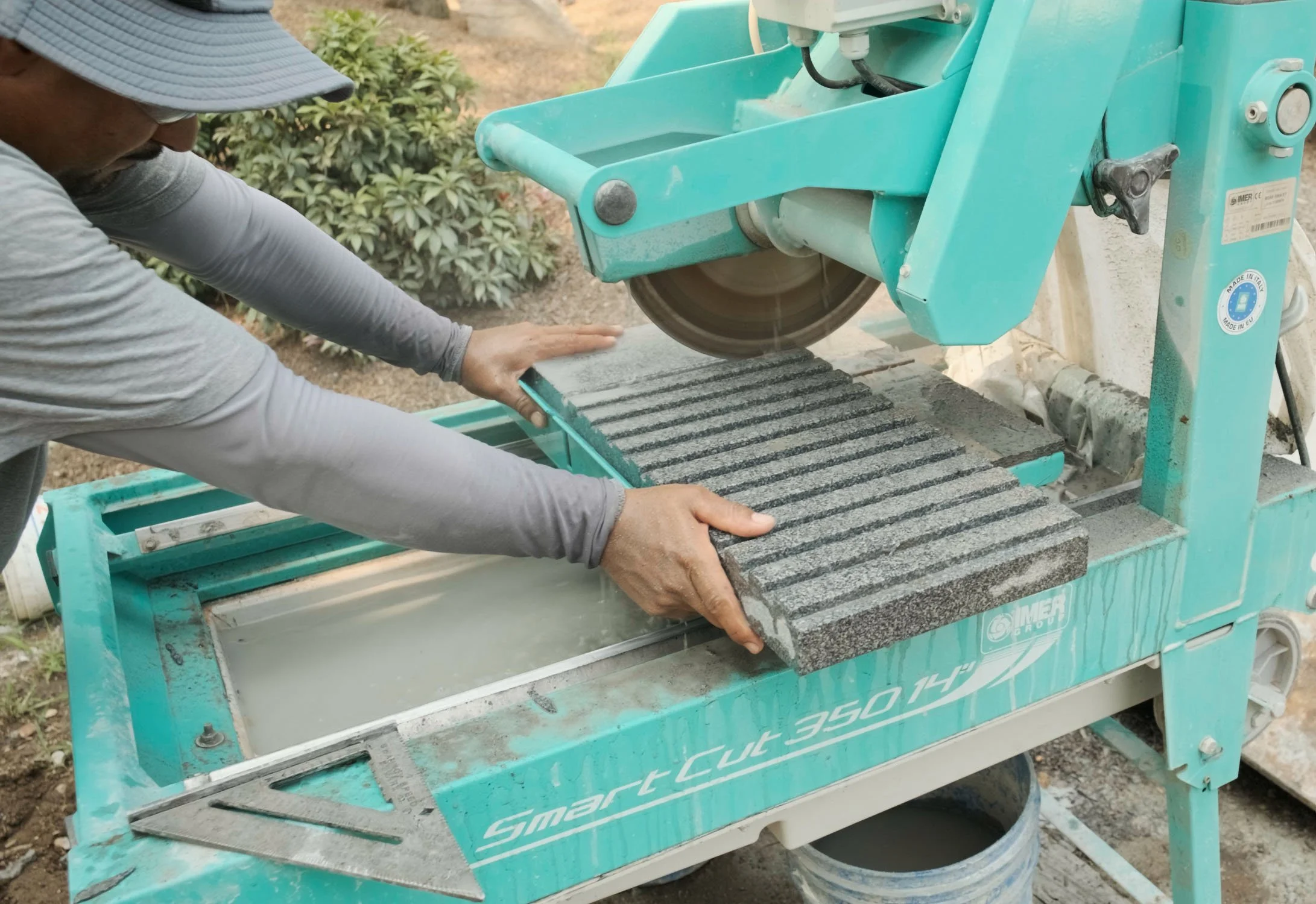 Cutting Ash granite for a modern Japanese nobedan path