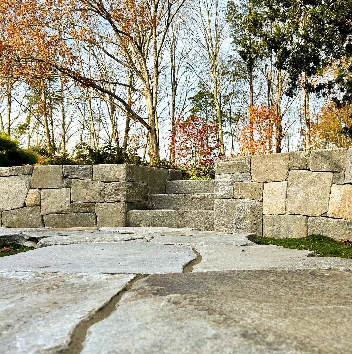 Japanese stone wall and stone steps in quiet Japanese landscape
