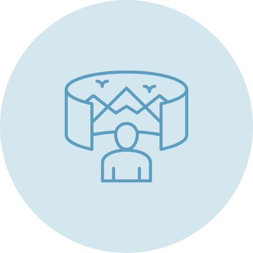 A person viewing a large landscape map with mountains and birds