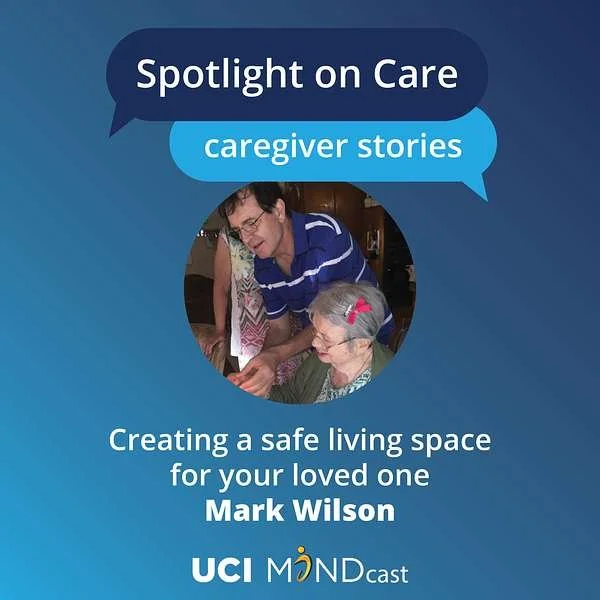 Brochure cover titled "Spotlight on Care: Caregiver Stories," showing a caregiver assisting an elderly woman with gray hair and pink hairpins, with text about creating a safe living space for loved ones, and logos for UCI MINDcast.