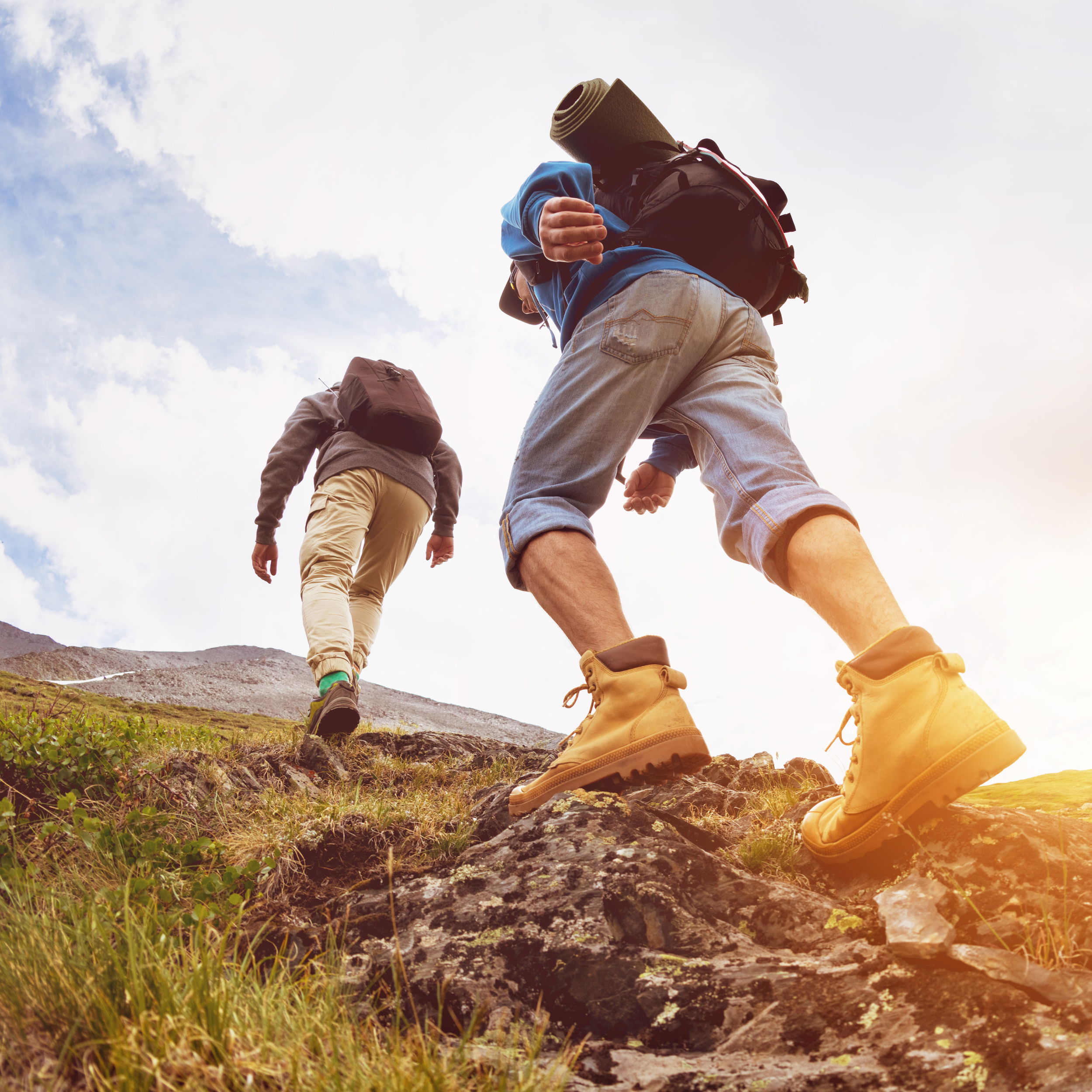 Two hikers practice perseverance as they work towards their goal of buliding character