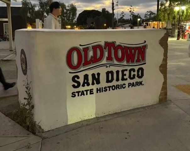 Painted sign saying "Old Town San Diego State Historic Park"
