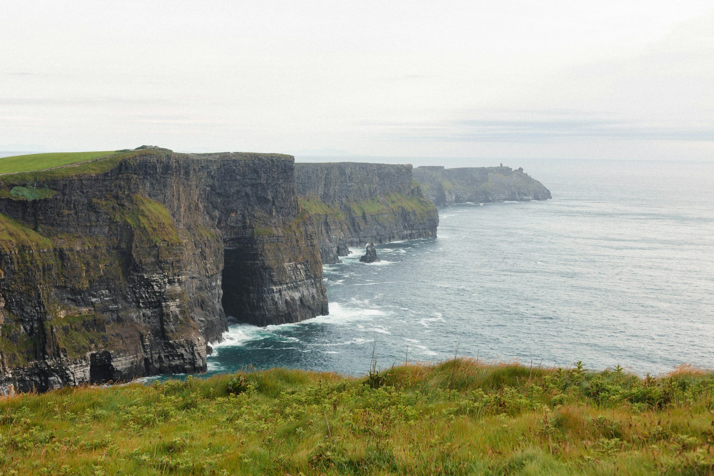 The beautiful Cliffs of Moher on a foggy day