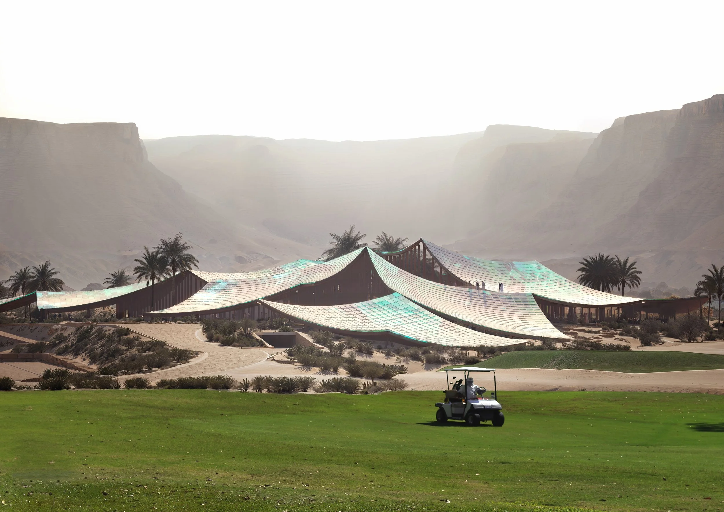 A modern clubhouse with a unique, undulating roof structure on a golf course, surrounded by palm trees and mountains in the background.