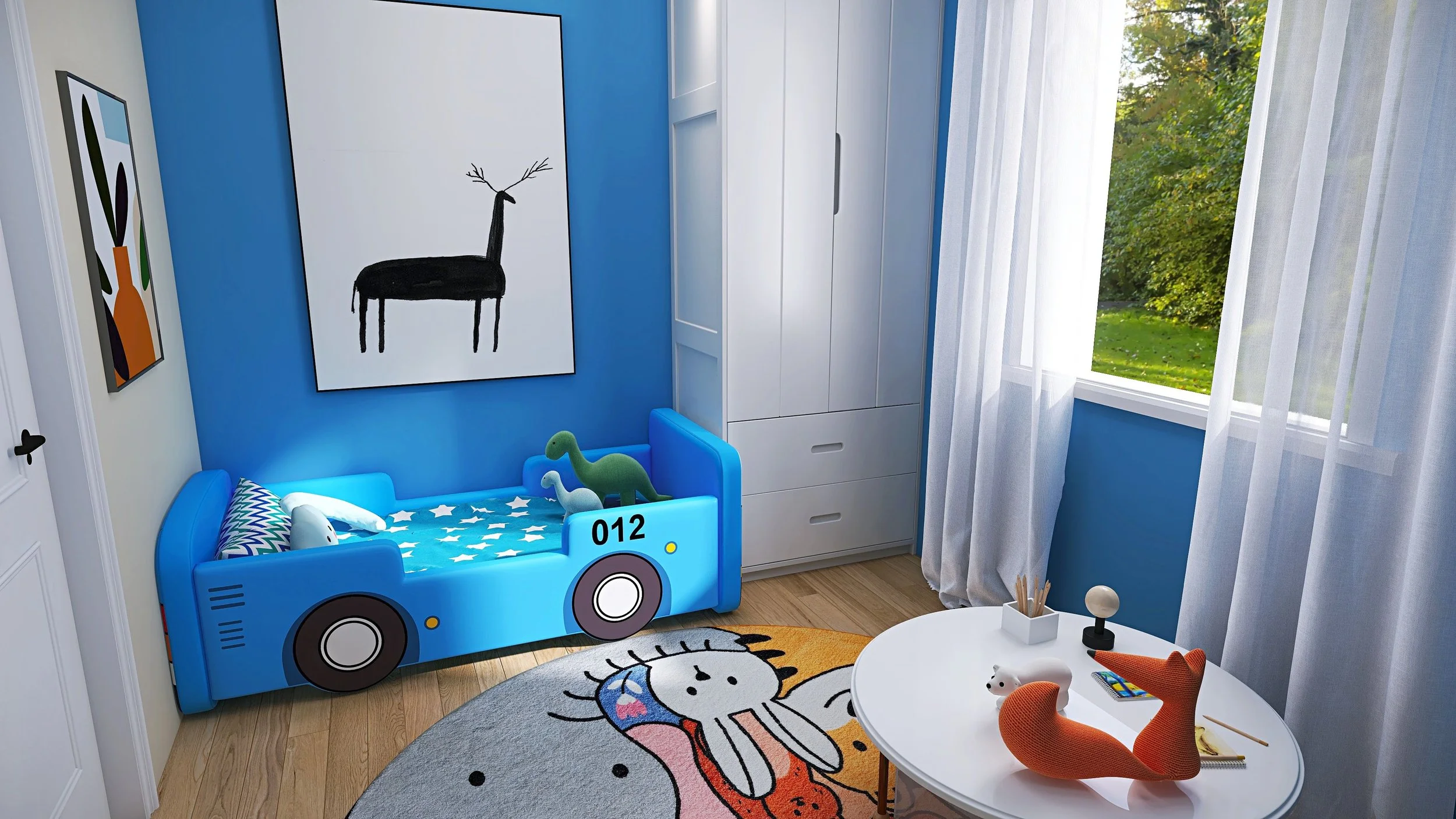 A colorful children's bedroom with a blue wall and a window. There is a blue bed shaped like a car with plush toys inside. The room has modern artwork on the walls and a white round table with decorative items, including orange fox-shaped sculptures. The floor is wooden, and there is a playful rug featuring a cartoon character.