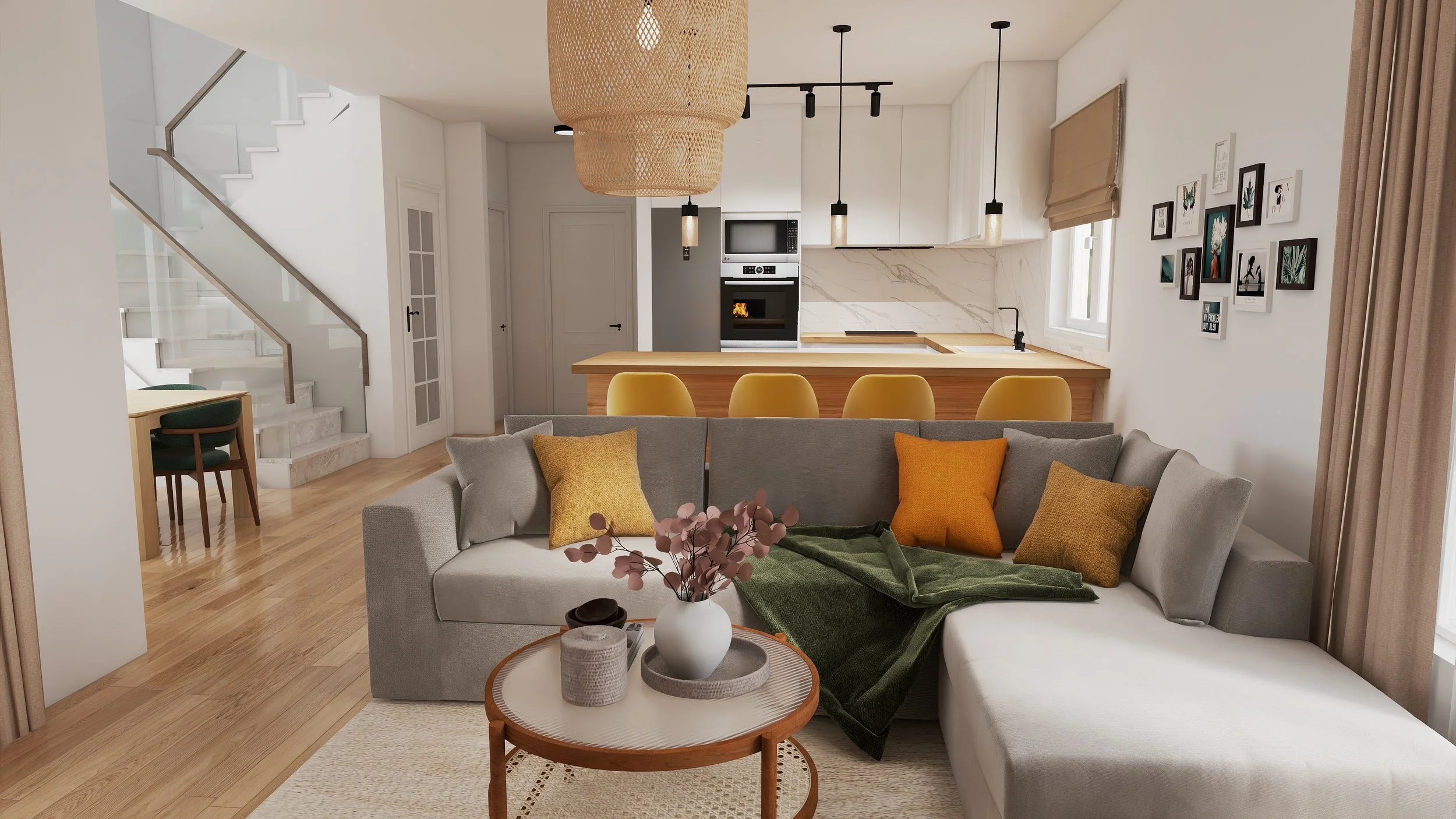 Open-concept living room and kitchen with gray sofa, yellow pillows, green blanket, wooden coffee table with decorative items, white walls, framed pictures, kitchen island with yellow stools, modern appliances, marble backsplash, window with beige curtains, staircase with white railing.