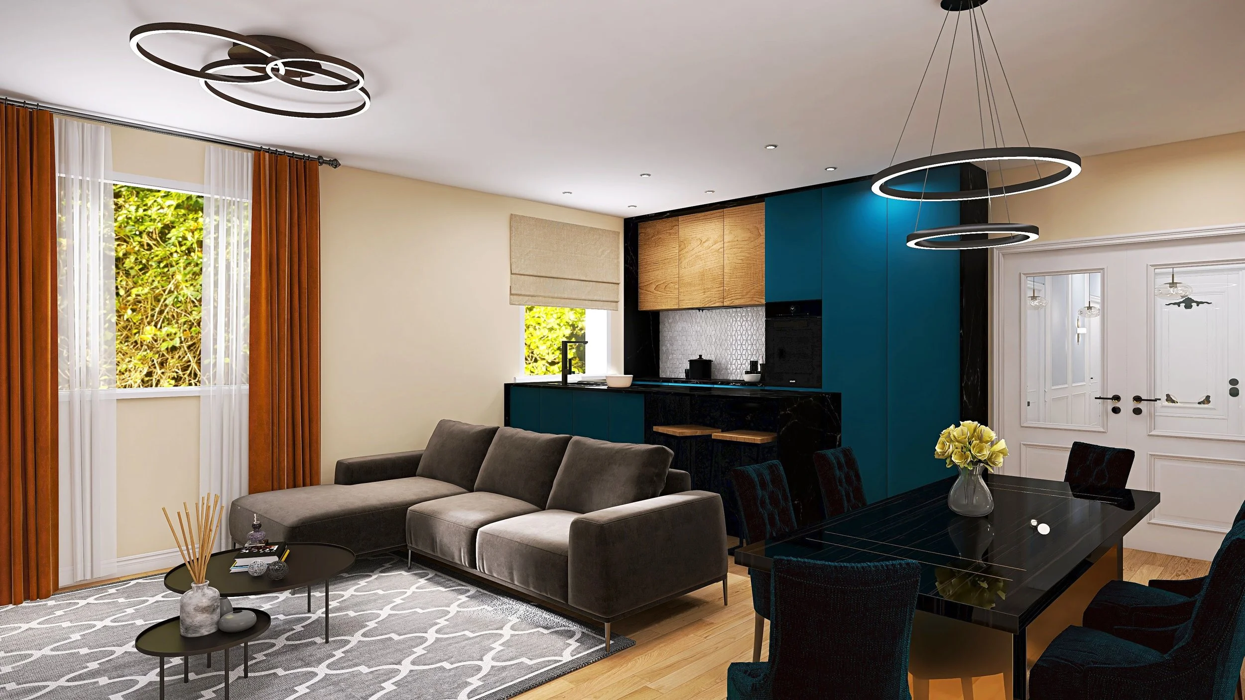 Modern open-concept living room and kitchen with gray sectional sofa, black coffee tables, beige and dark blue cabinetry, black patterned backsplash, dining table with black chairs, large window with white and orange curtains, pendant lights, and a white door with glass panels.