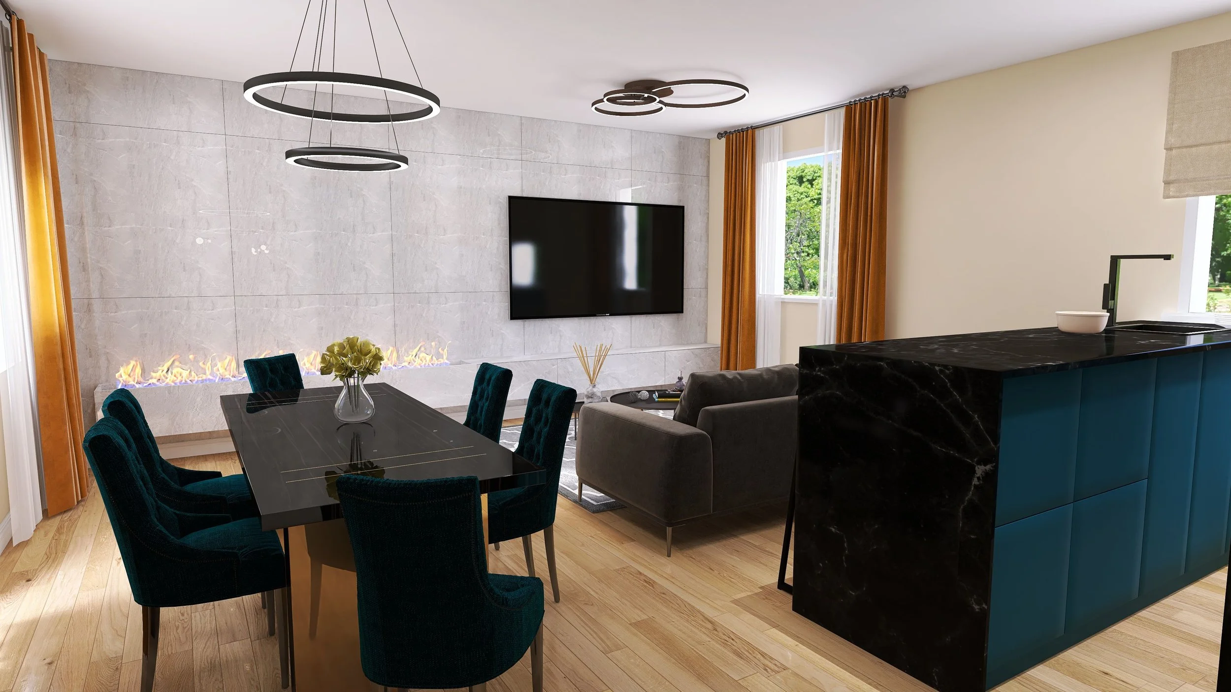 Modern living and dining room with a black TV mounted on a gray marble accent wall, a black marble kitchen counter with teal cabinetry, a dark gray sofa, teal dining chairs, a fireplace with flames, a glass vase with yellow flowers, and large windows with white and orange curtains.