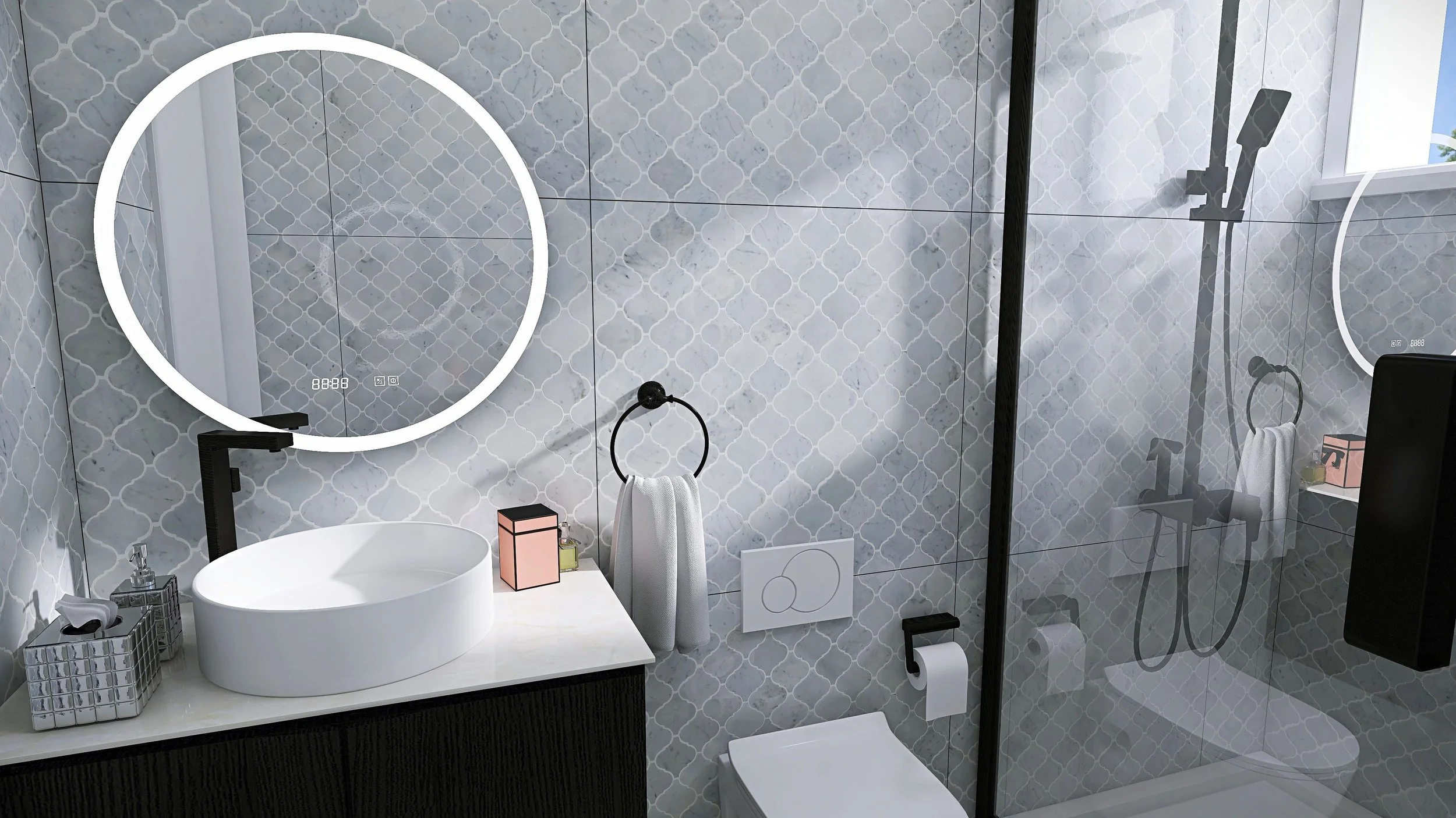 Modern bathroom with a round illuminated mirror above a white vessel sink, a black faucet, a small shelf with pink and green bottles, a towel ring with a white towel, a toilet with a wall-mounted flush, and a glass shower with black fixtures and a window.