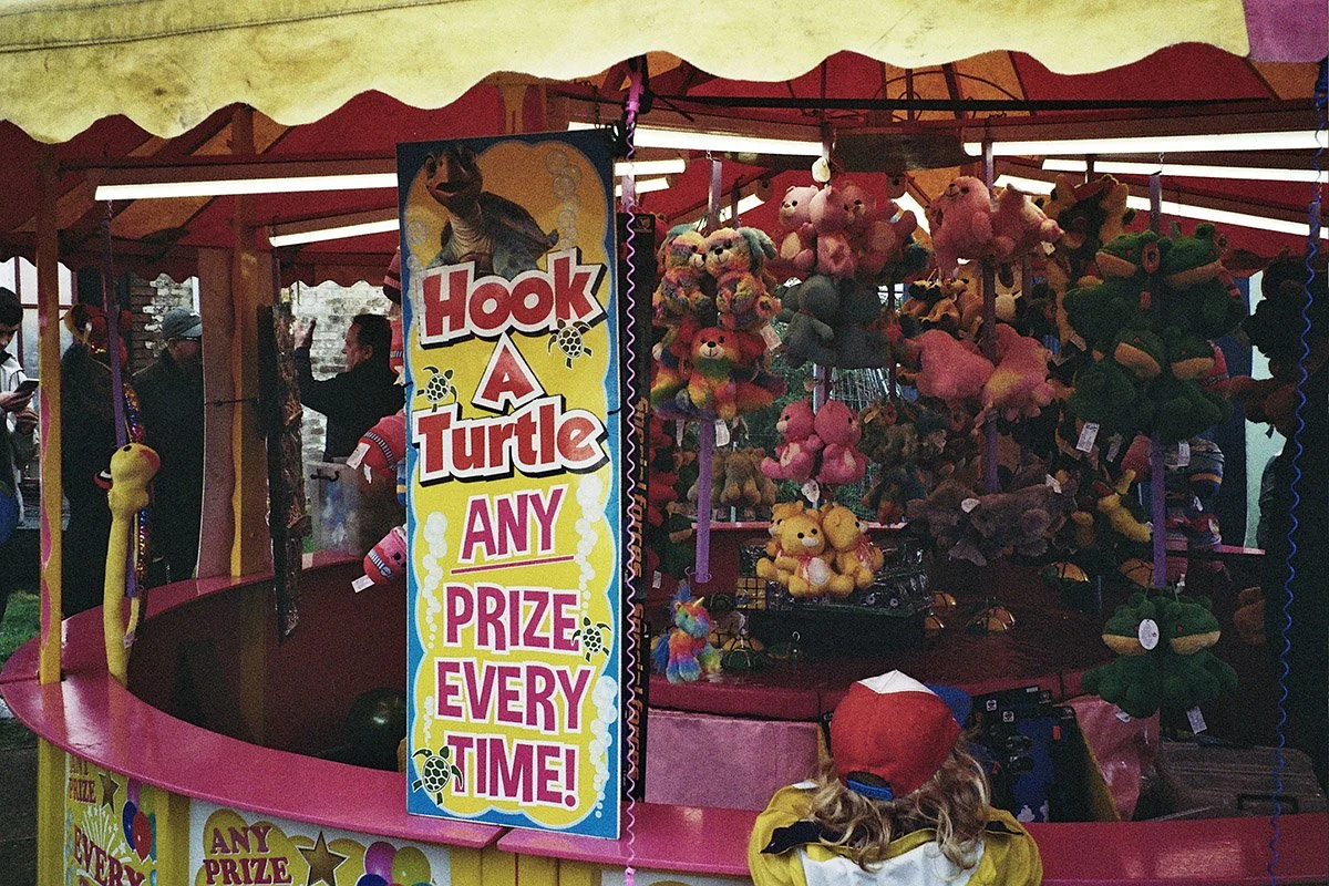 Hook a duck style carnival stall at Newhaven East Family Fun Day with Pat's pizza