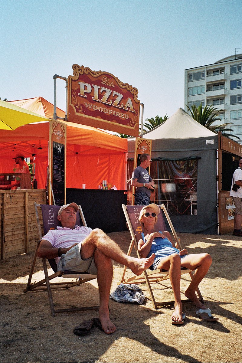 Sunbathers enjoy the Eastbourne Airshow from a deckchair