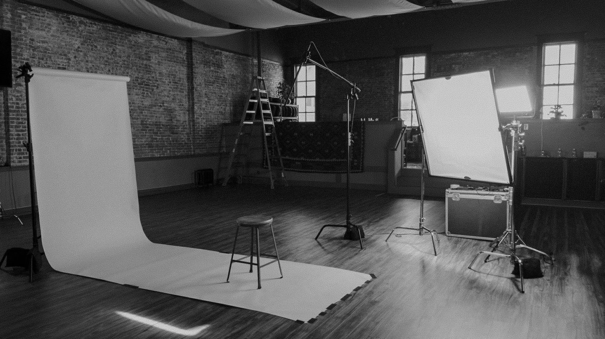 A video production set in Bellingham, Washingtonfeaturing a backdrop, microphone, and lights.