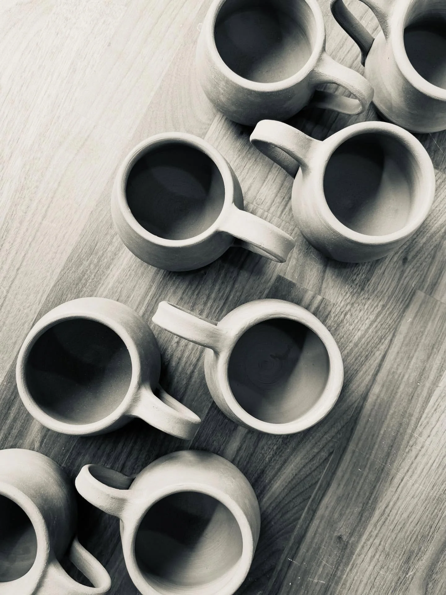I&rsquo;m by no stretch of the imagination a fast potter. In fact, I&rsquo;m a slow, meticulous, and overthinking one right now. However, seeing this small, mostly uniform set of mugs drying on my ware board gives me great satisfaction. I&rsquo;m imm
