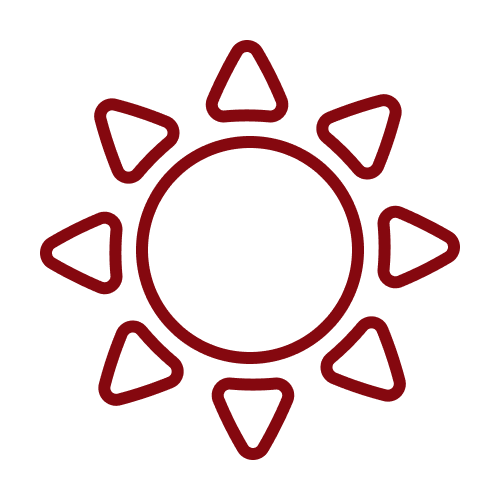 Red sun icon with a central circle and eight triangular rays on a black background.