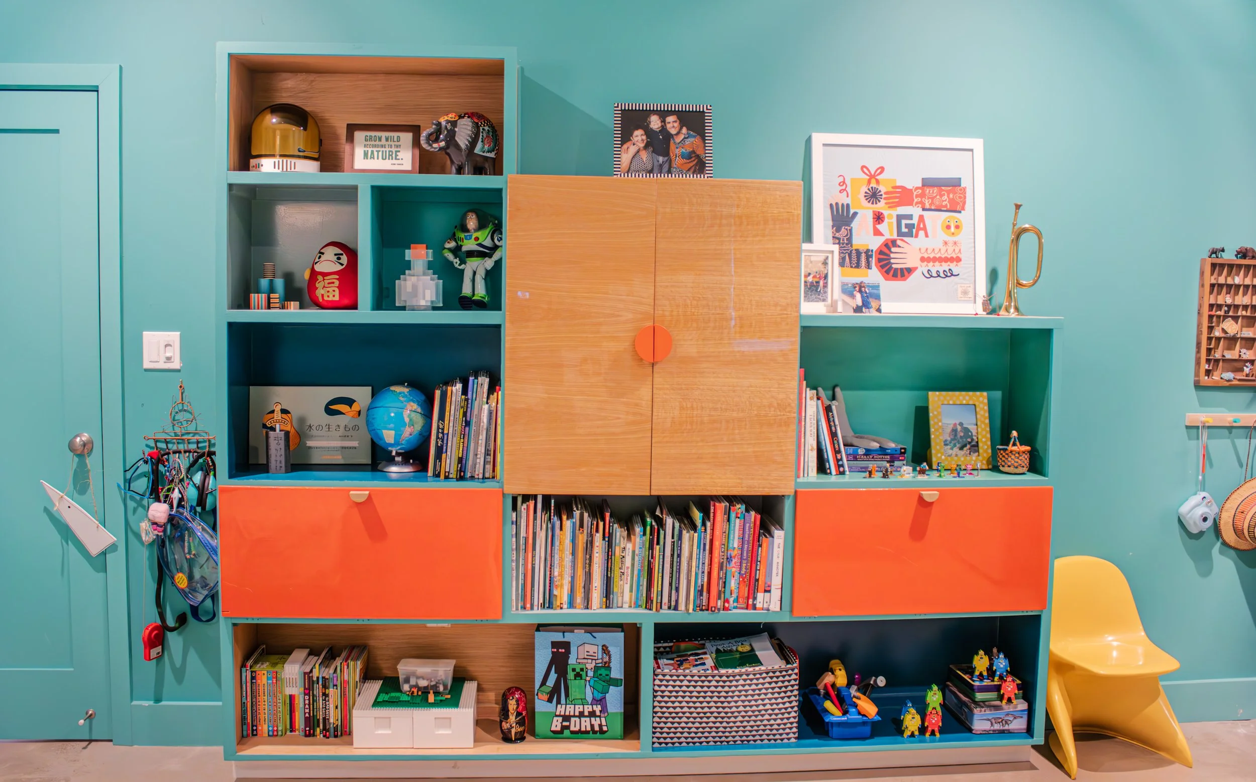 Custom built-in storage creates opportunities for display as well as hiding away toys. 
 
Construction: Hyperion Design and Build