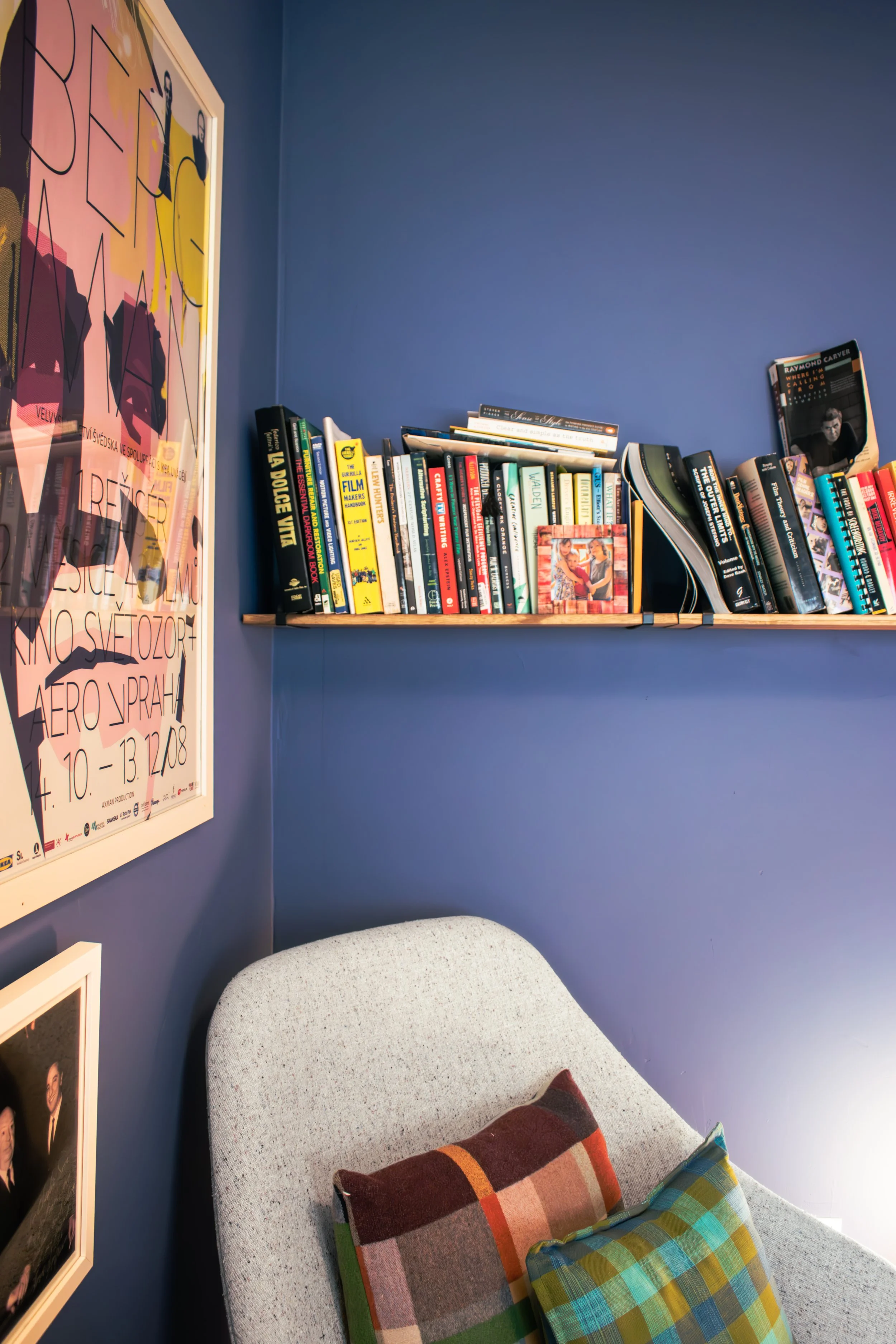 The saturated tones of Farrow and Ball's Pitch Blue give this office space a warm and inviting feel.  