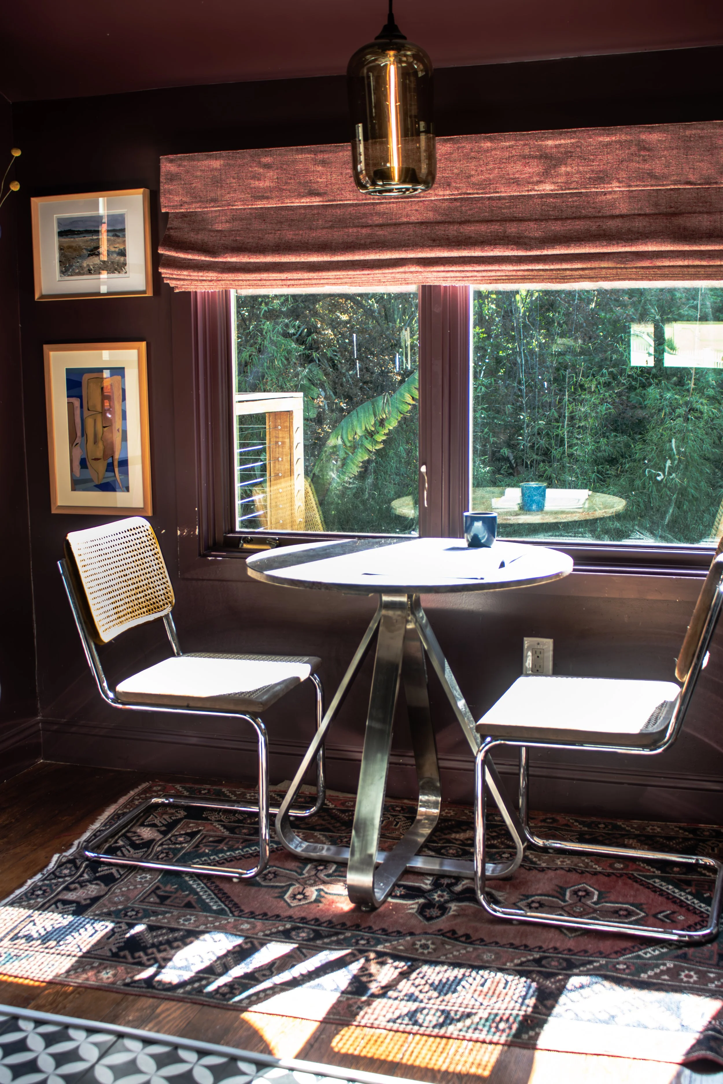 Lush and tropical greenery in the backyard pops against Farrow and Ball's Brinjal. 

Construction: Hyperion Design and Build
