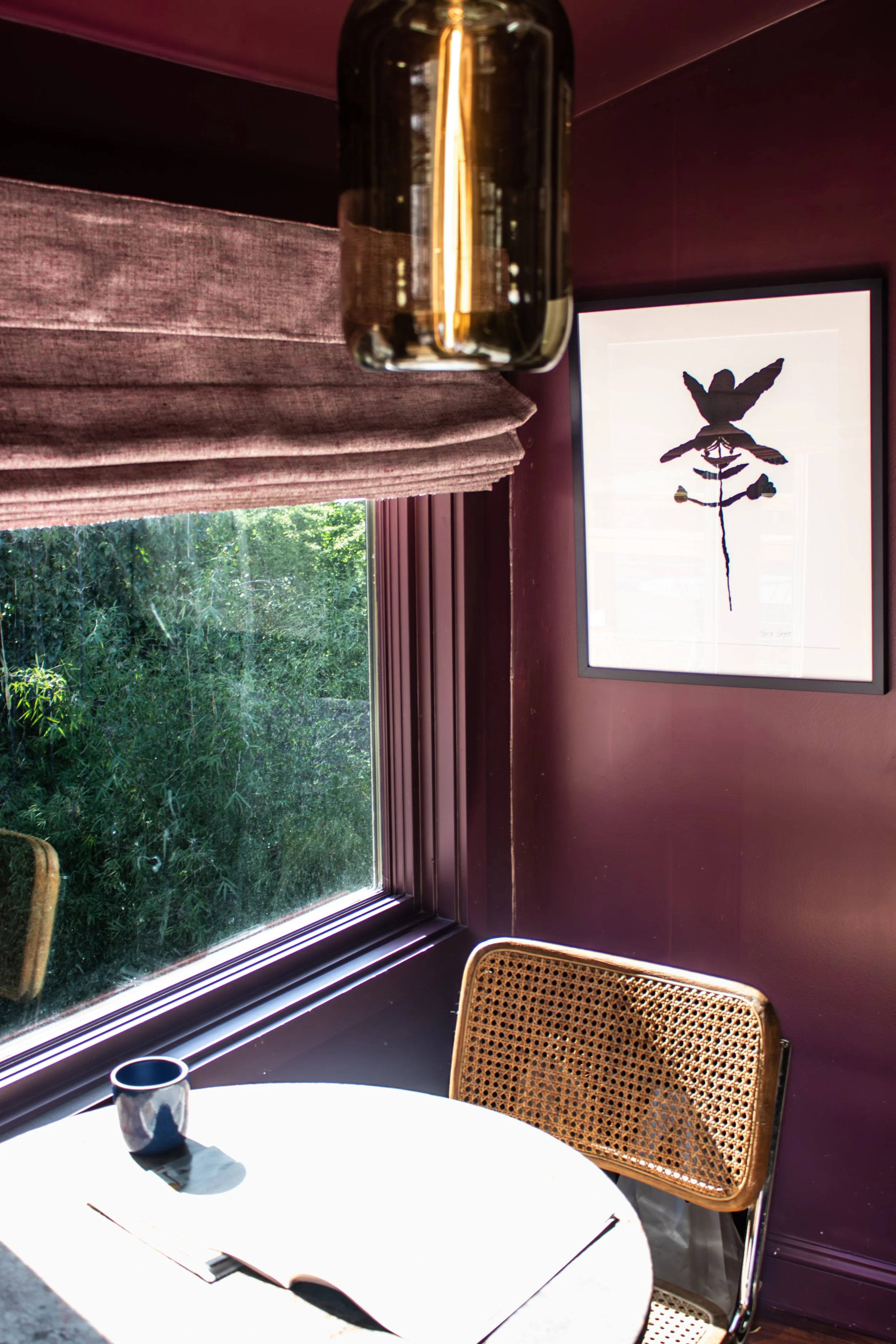 Lush and tropical greenery in the backyard pops against Farrow and Ball's Brinjal. 

Art: Elana Cooper / Creativity Explored
Construction: Hyperion Design and Build
