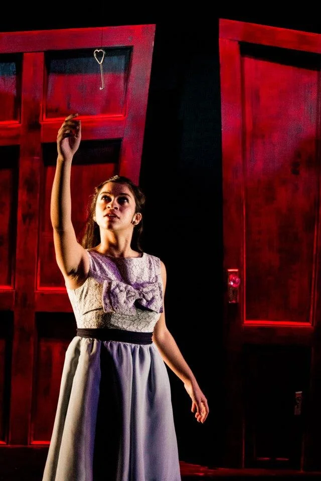 Red doors and floating heart key "Alice in Wonderland"