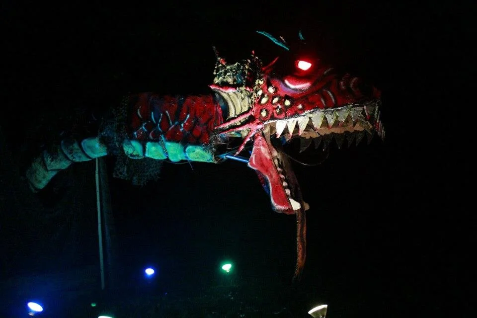 Smoke breathing dragon built on a backhoe 