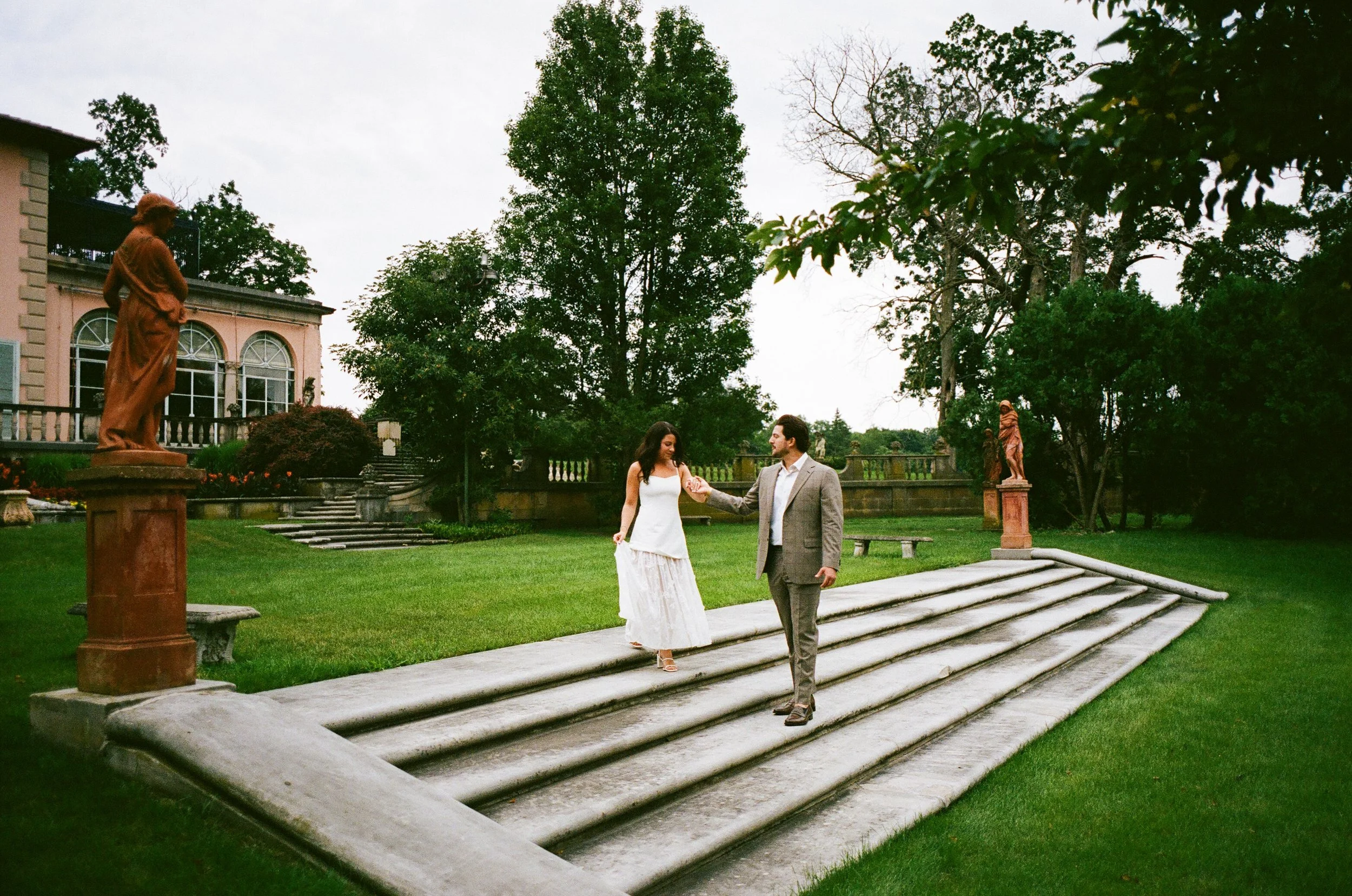 Dreamy 35mm film engagement photo at Cuneo Mansion, capturing authentic color and texture.