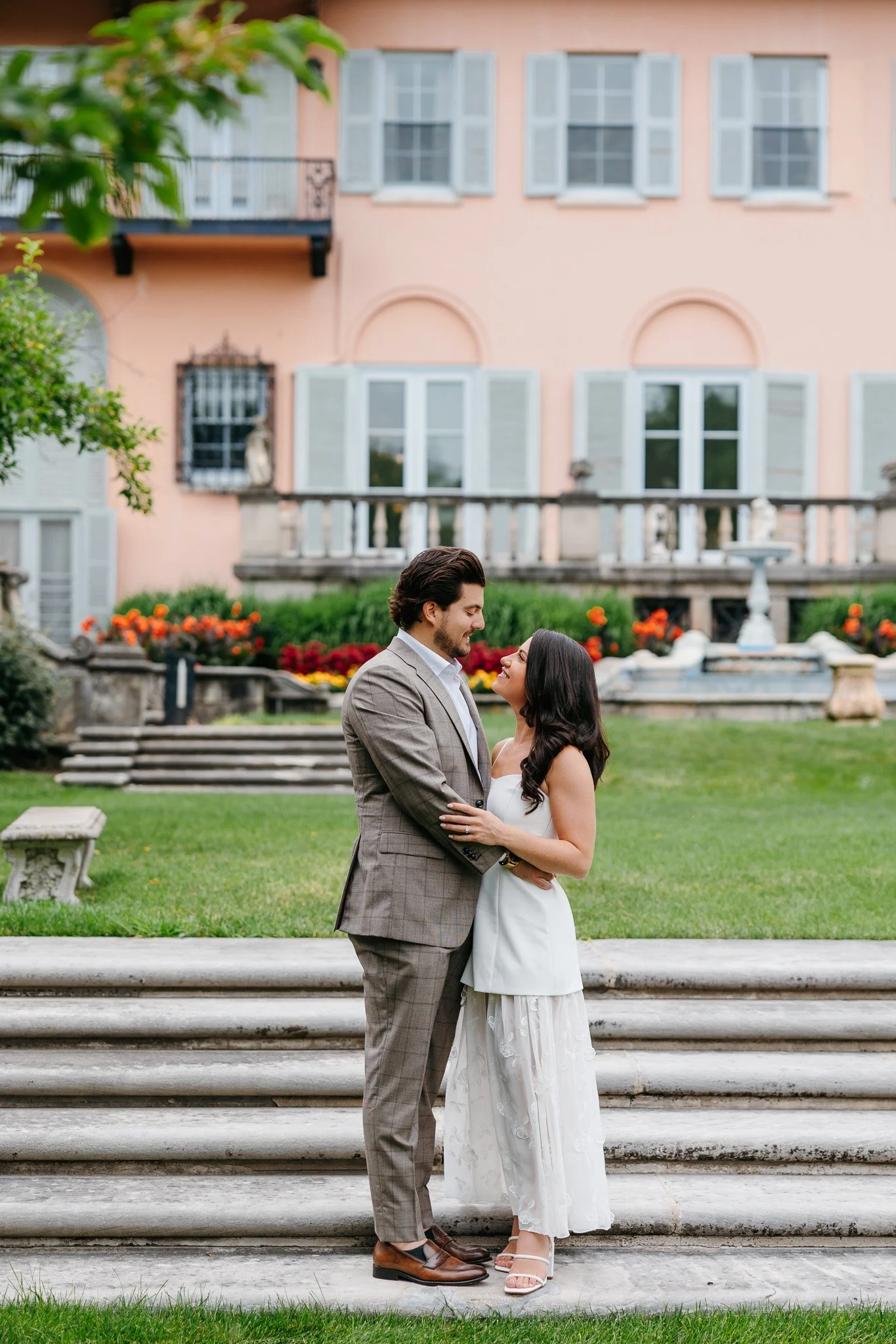 Joyful candid engagement session at Cuneo Mansion just outside of Chicago, documented in both digital and film.