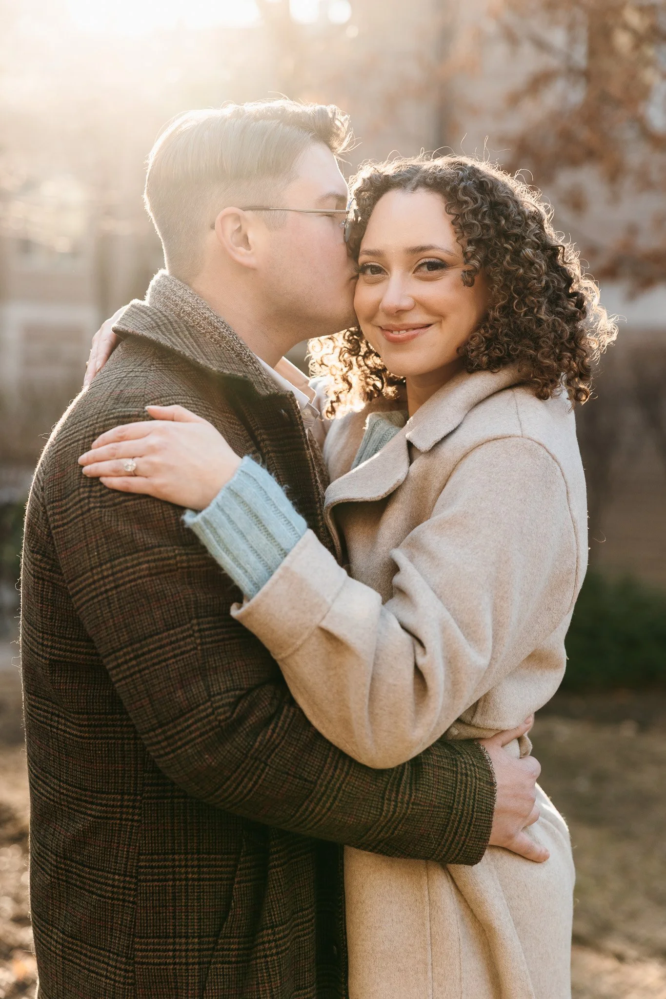 fall engagement photos couple in coats