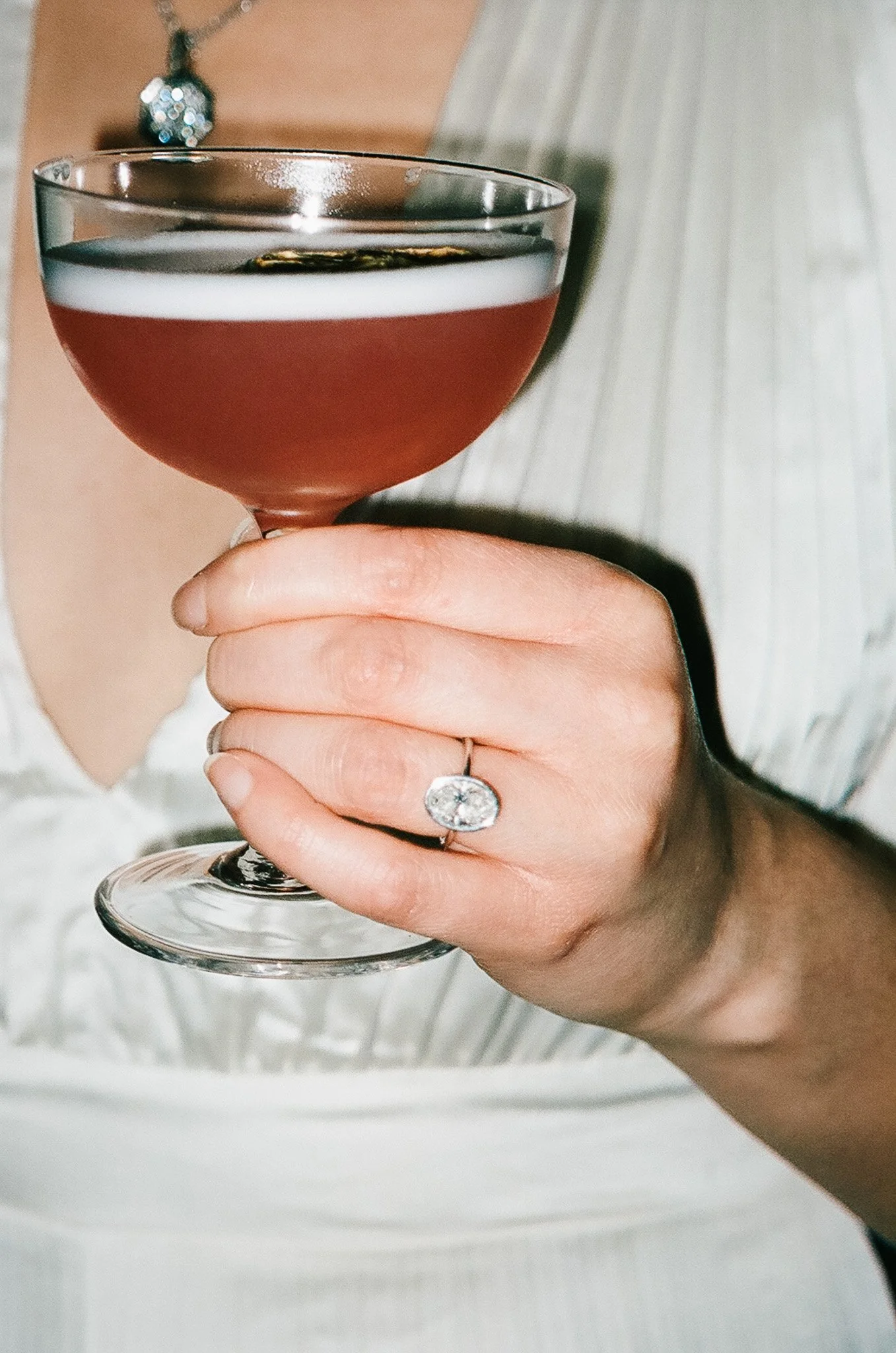 engagement photos with cocktail on film