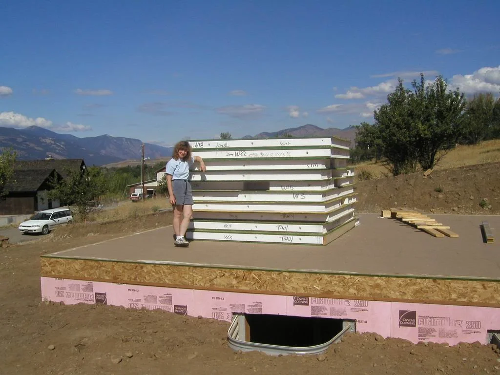 stack of SIP panels delivered to jobsite for installation