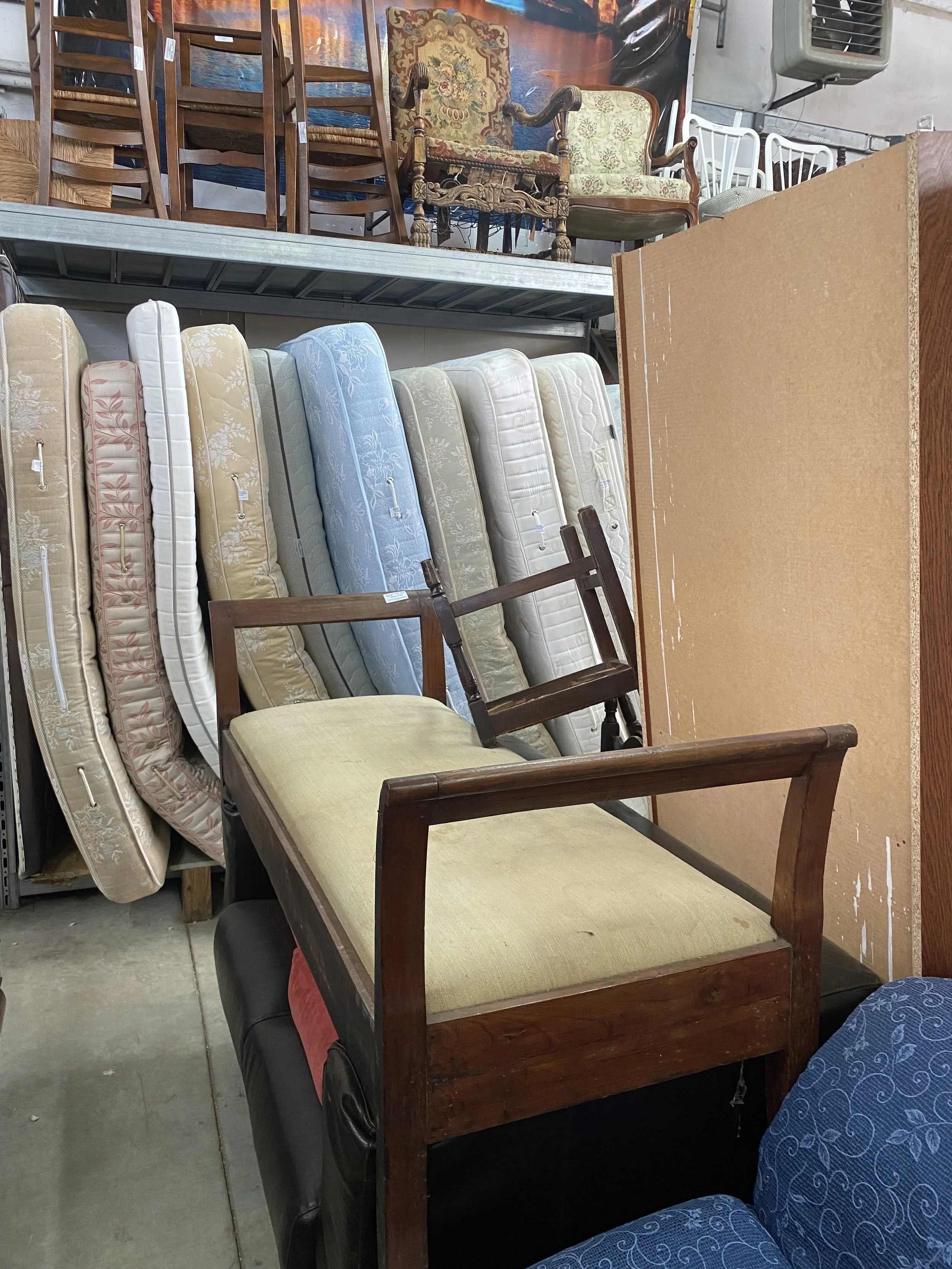 Antique wooden daybed found in Tuscany by Yvonne Koné for LAFINE shop in Copenhagen.
