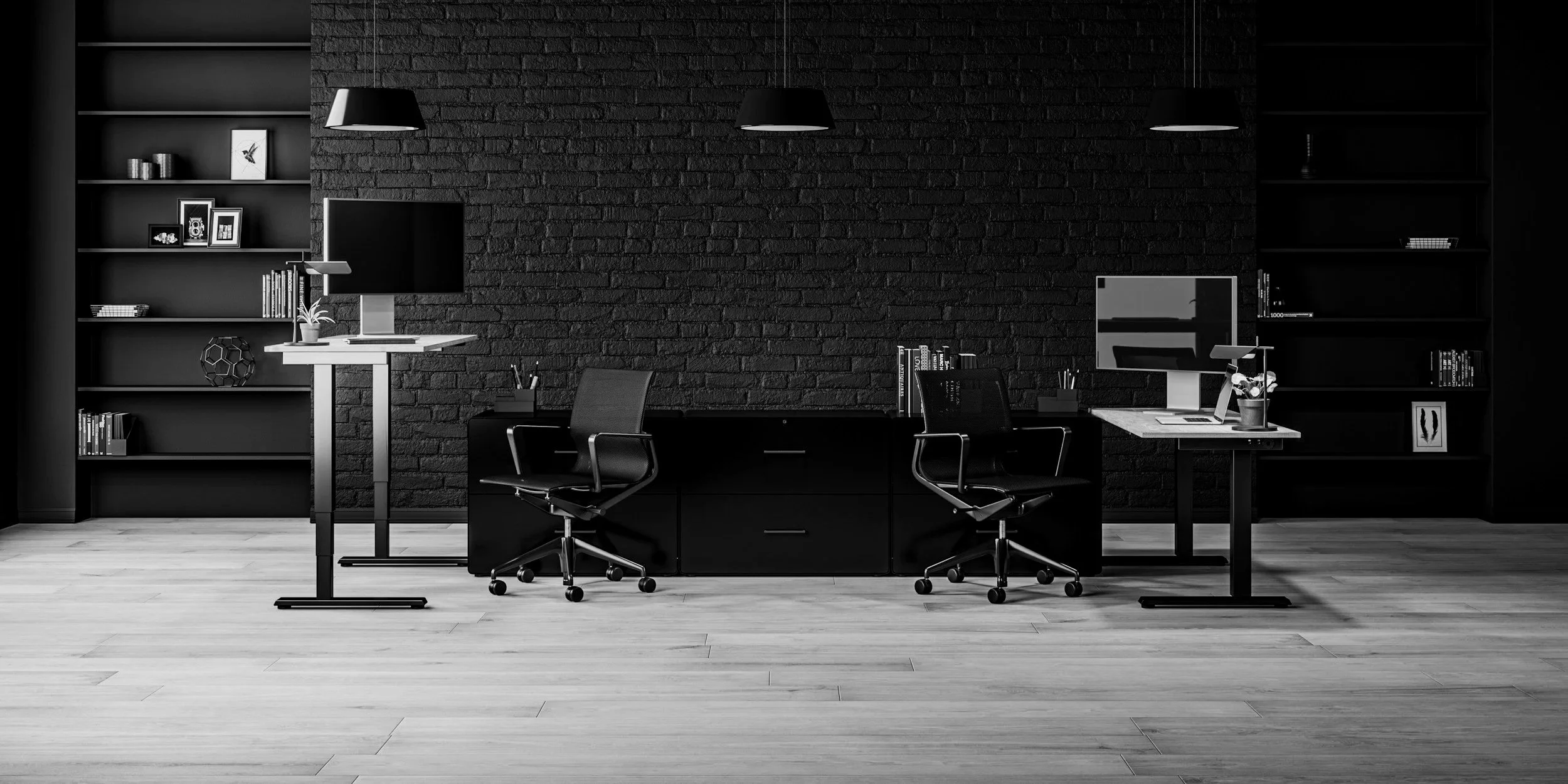 Modern office with two desks, office chairs, wall-mounted monitors, and black shelving units against a black brick wall.
