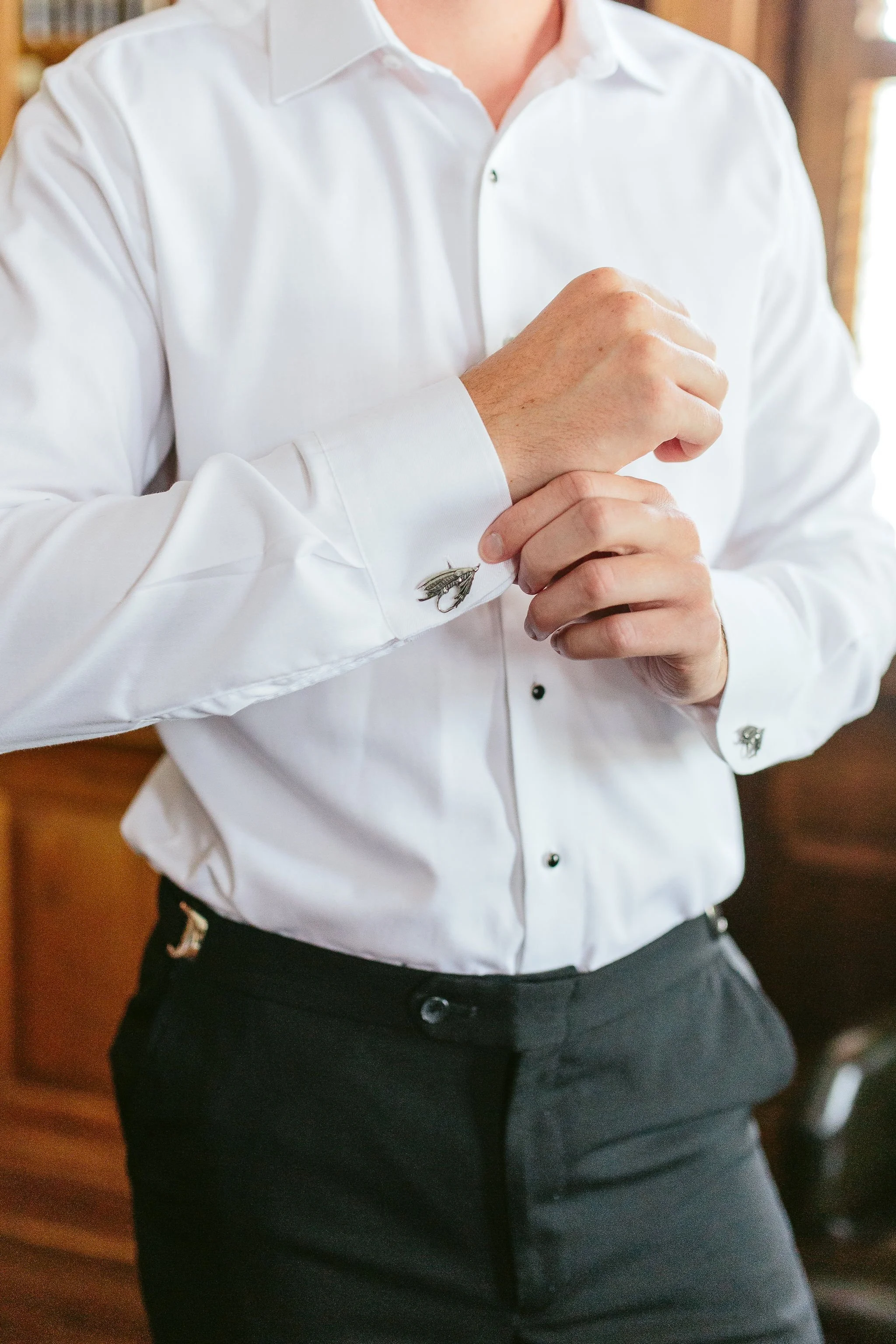 detail photo of groom cufflinks