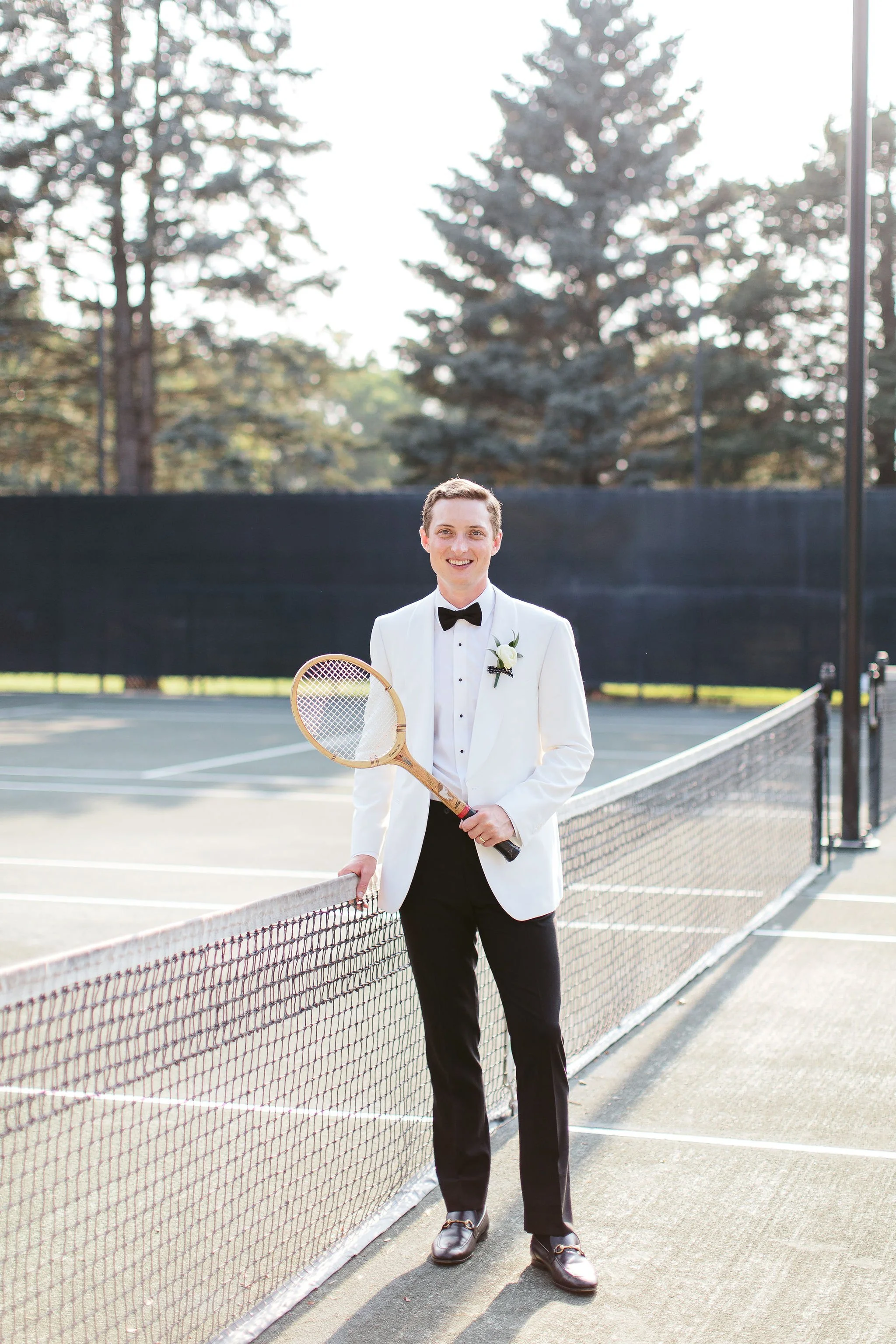 groom portrait on pickleball court