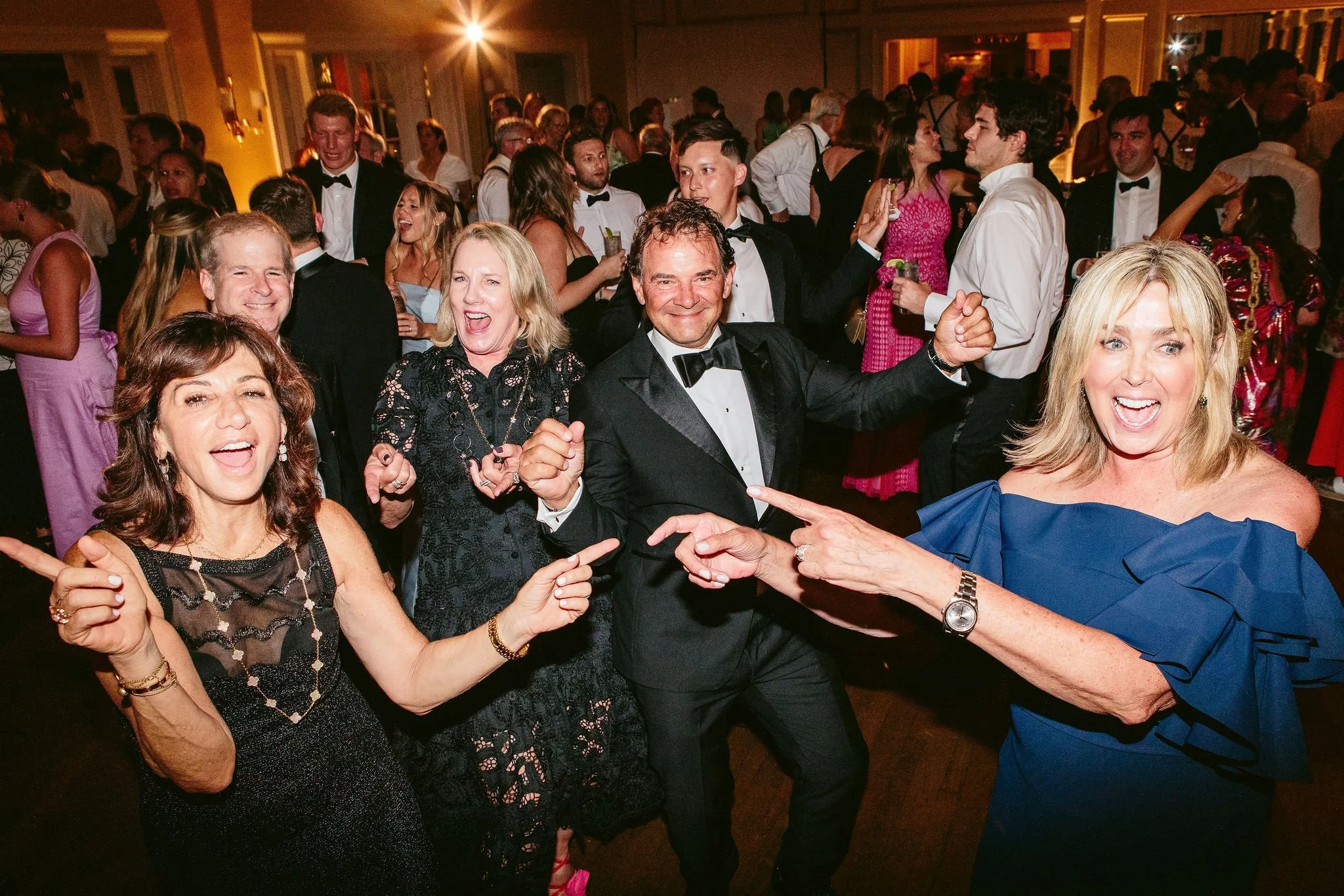 guests dancing at a wedding reception captured by nicodem creative