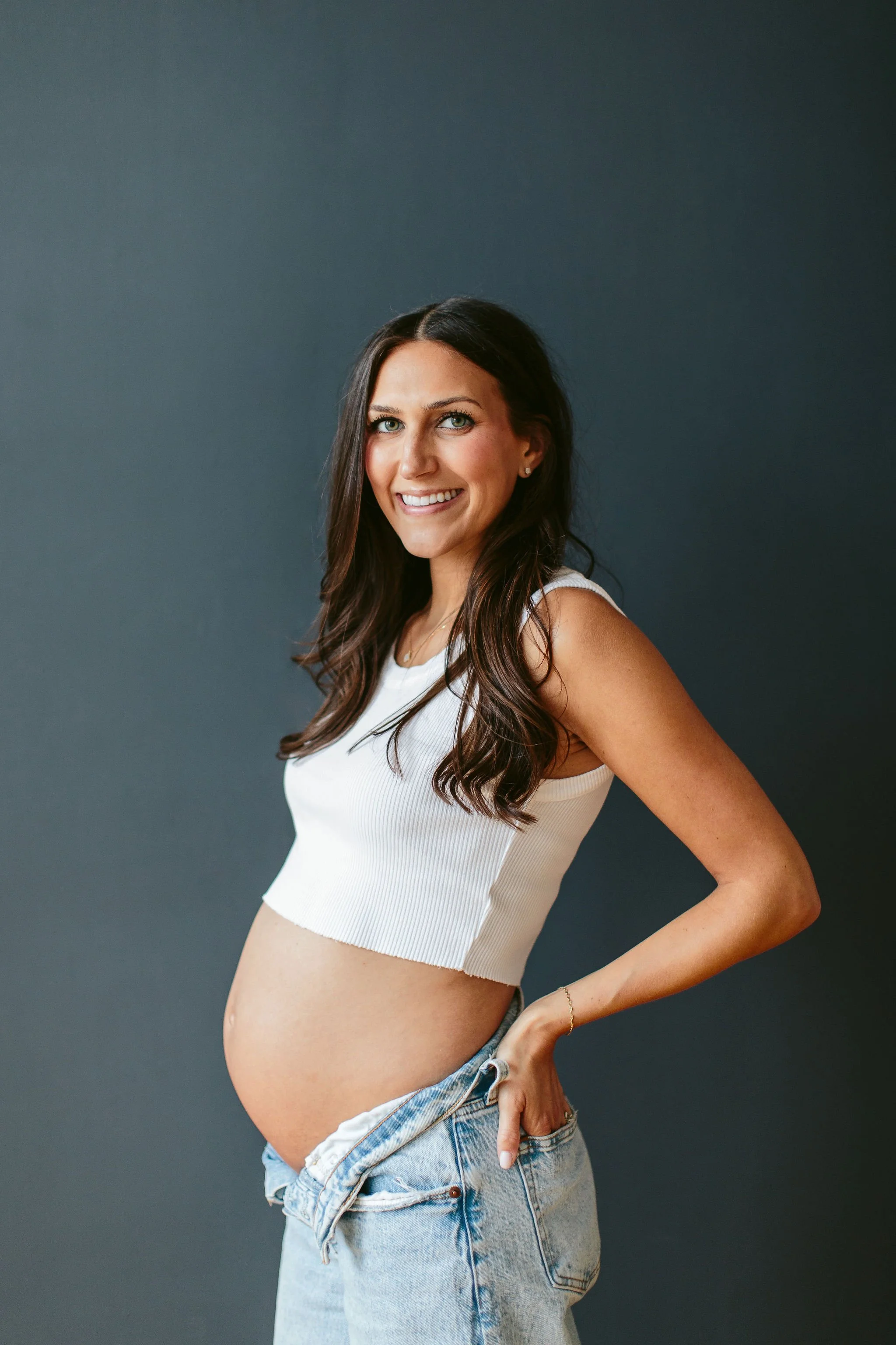 Maternity session with a dark background